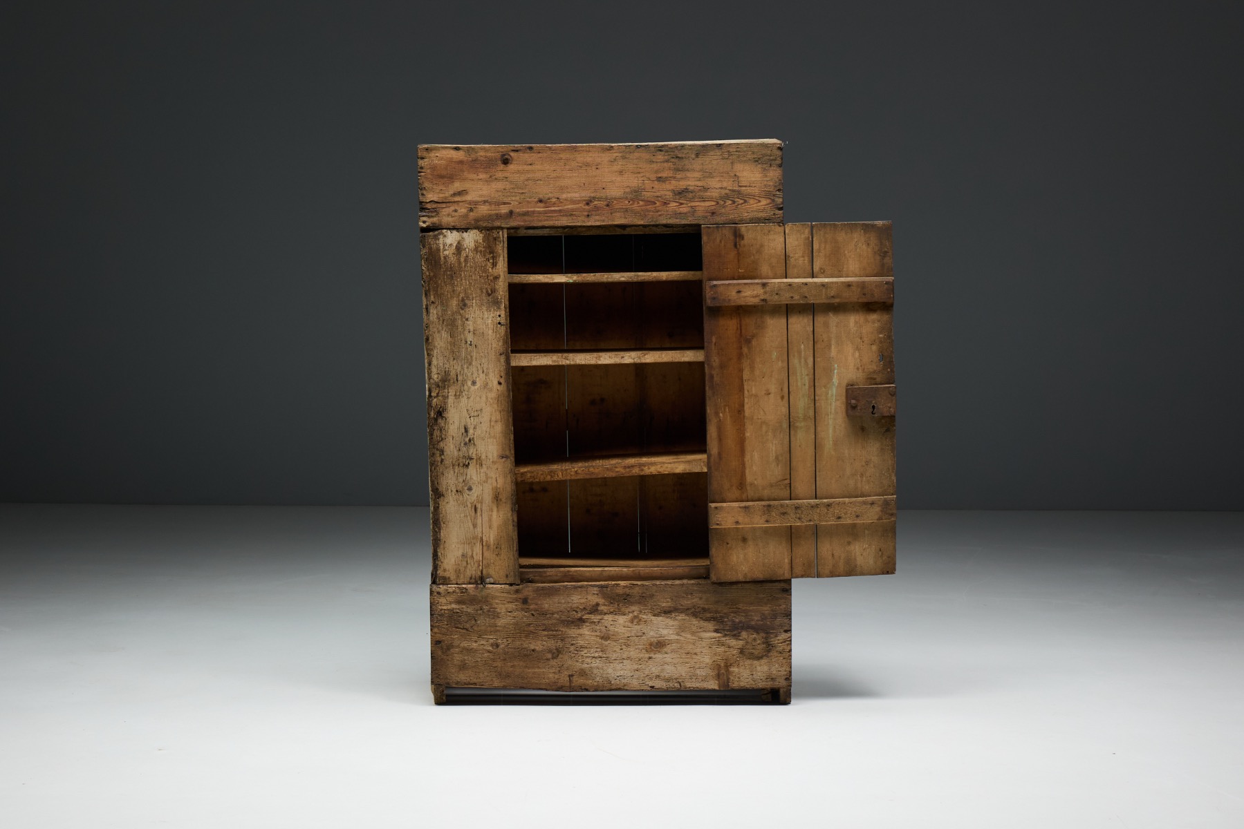 Vernacular storage cabinet from 19th century France with handcrafted details 