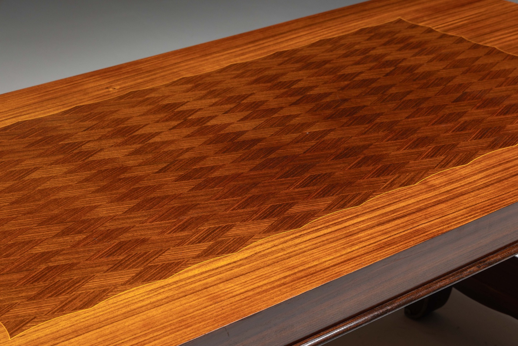 Art Deco dining table with subtle brass accents