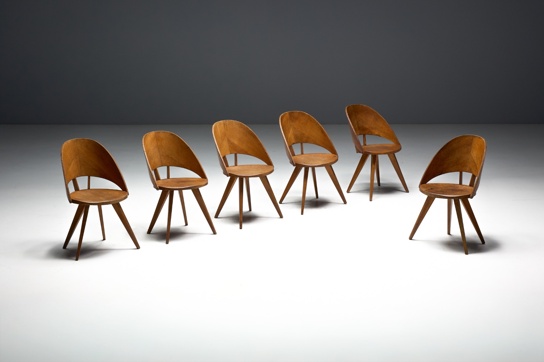 Classic Italian plywood dining chairs with clean lines