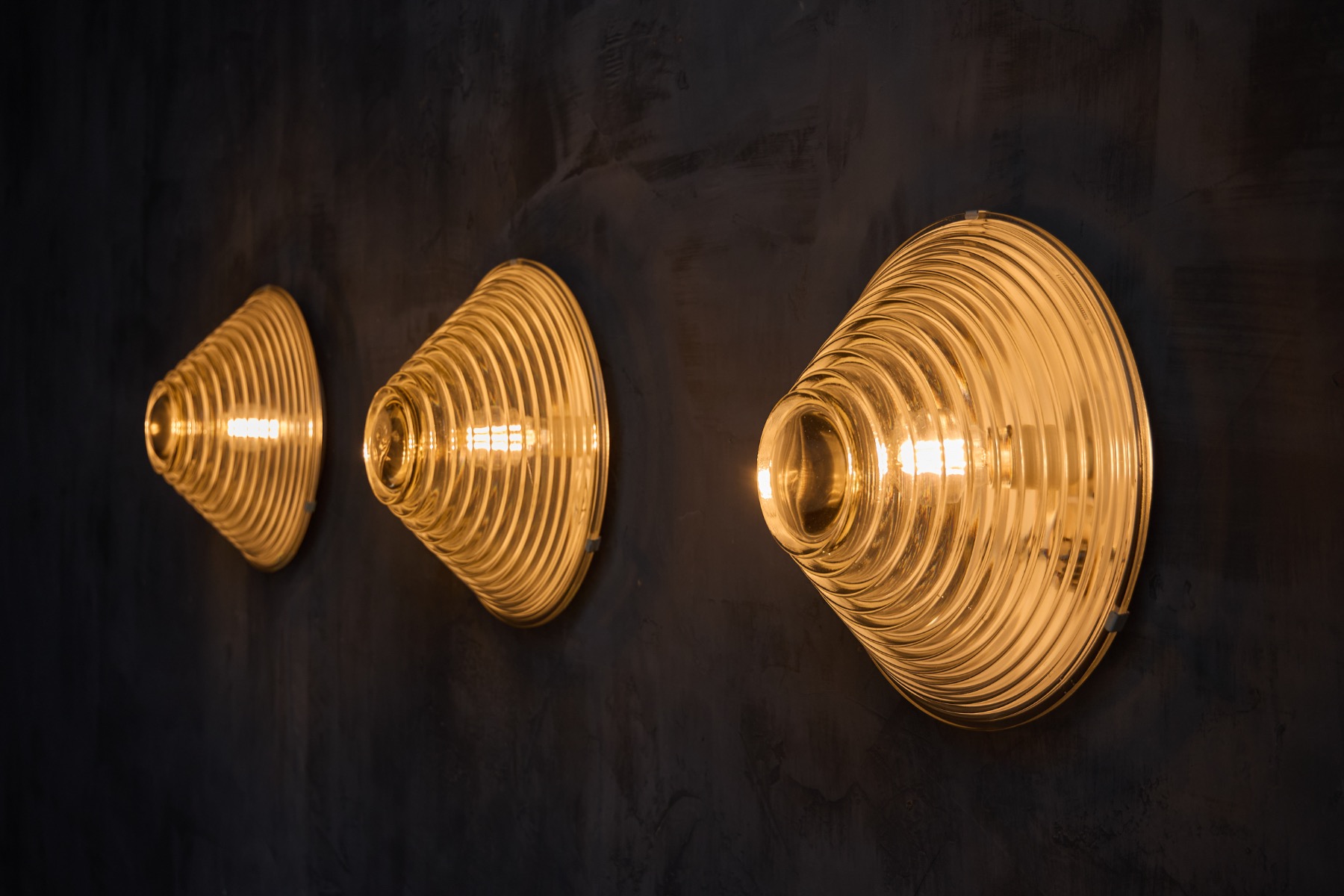 Collectible Italian wall lights in ribbed glass from the 1960s