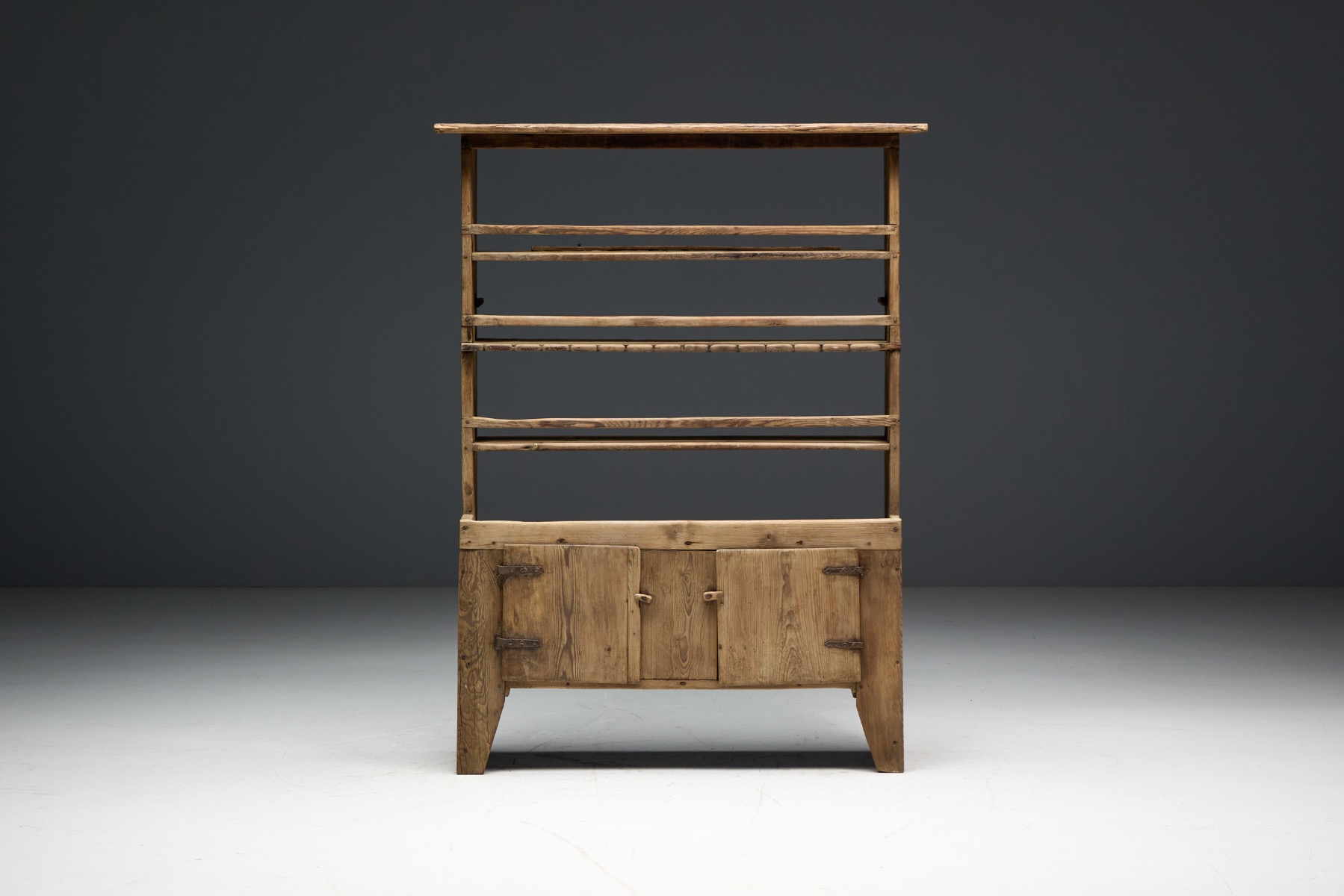 Collectible rustic primitive cabinet in antique wood