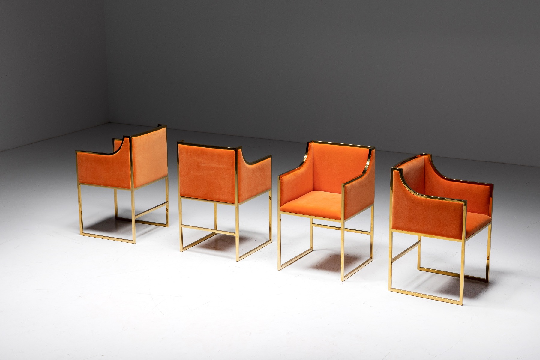 Statement 1980s dining chairs with brass and velvet