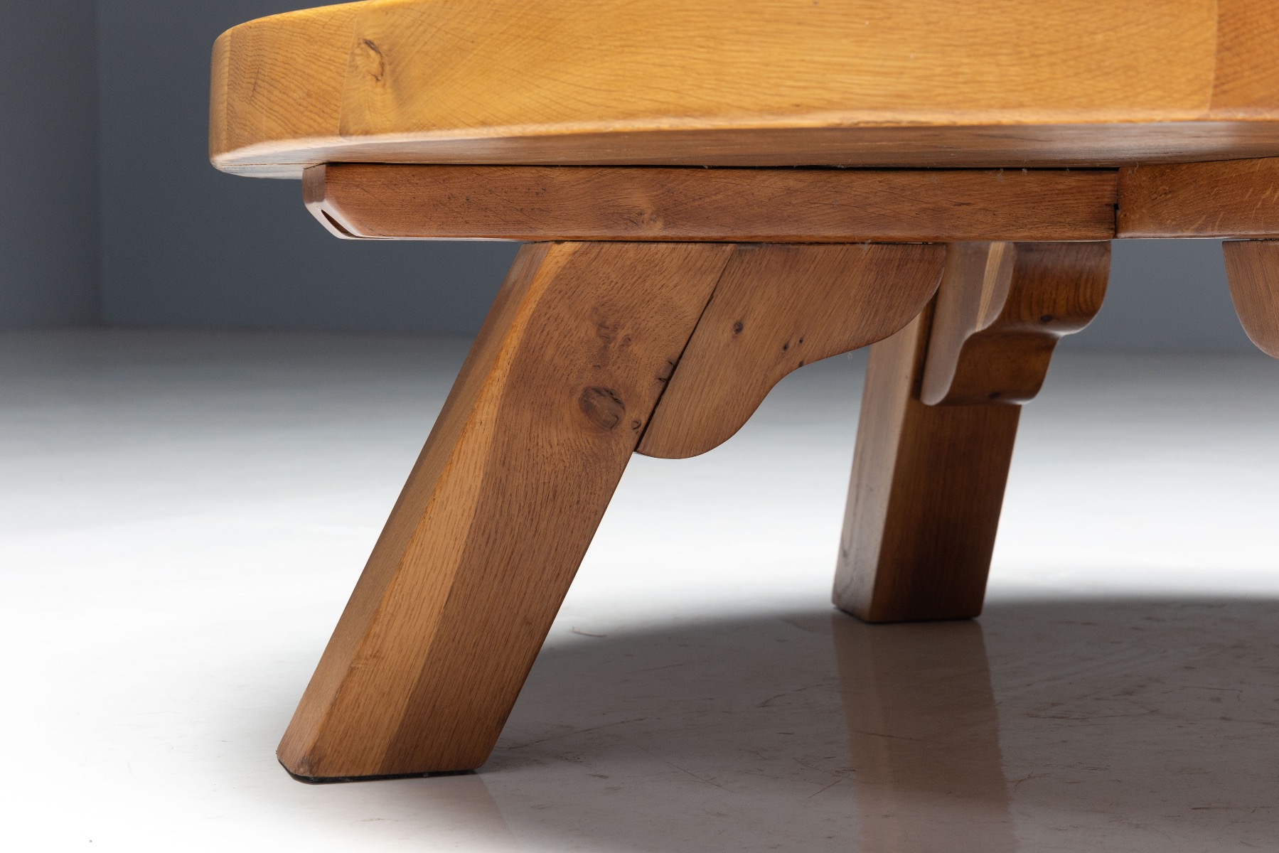 European brutalist round coffee table executed in oak