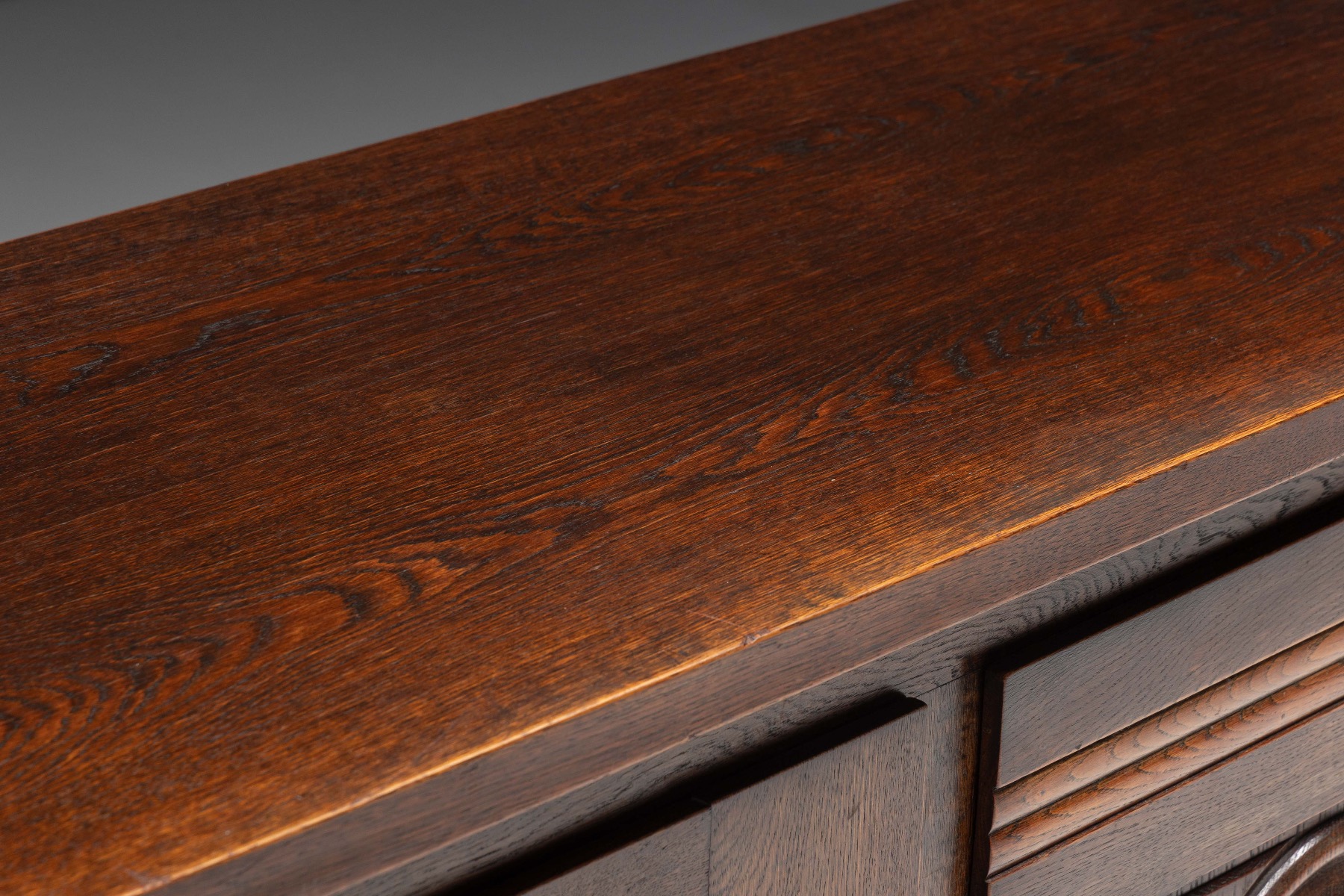 Art Deco oak sideboard with expressive geometric front