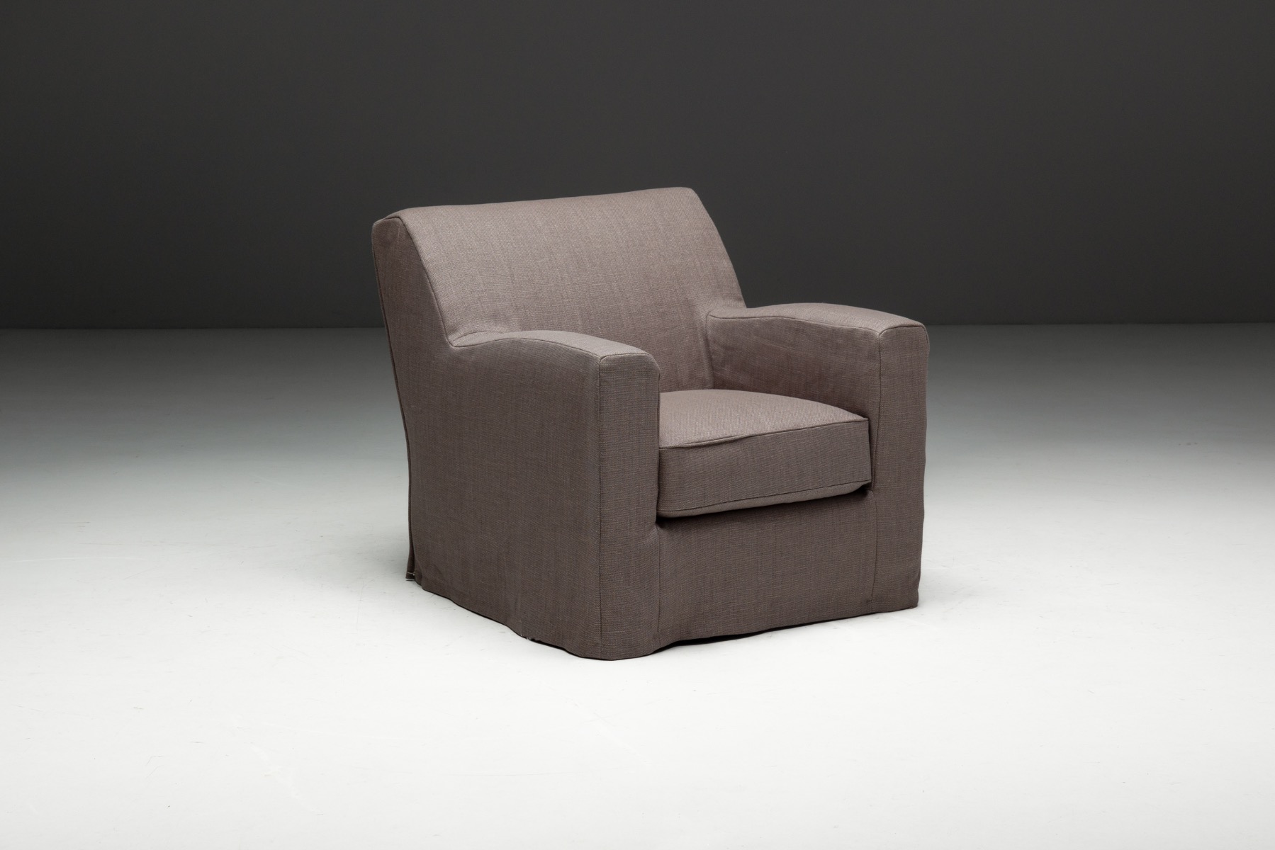 French 1990s lounge chairs with understated luxury
