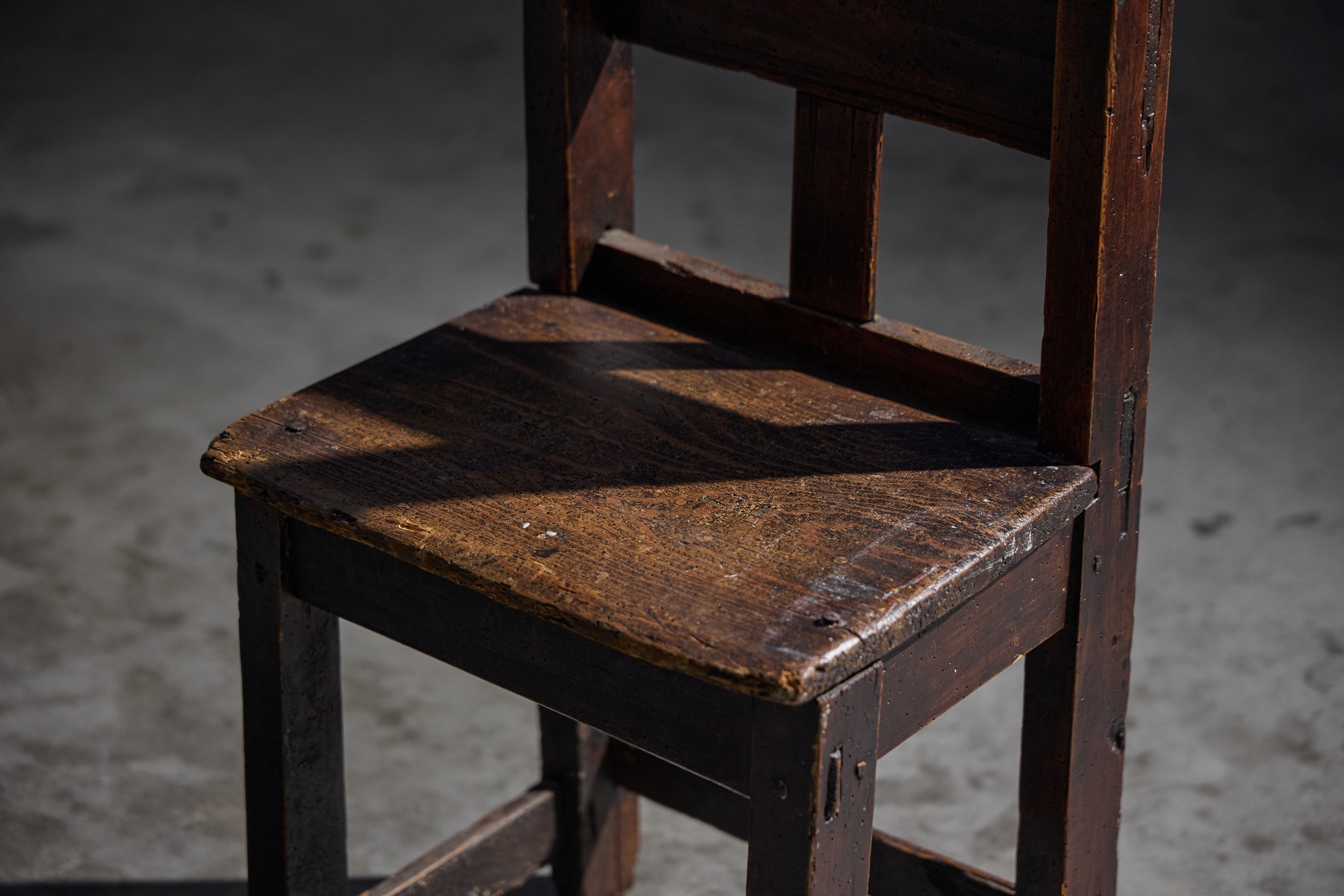 Museum level rustic wooden child’s chair