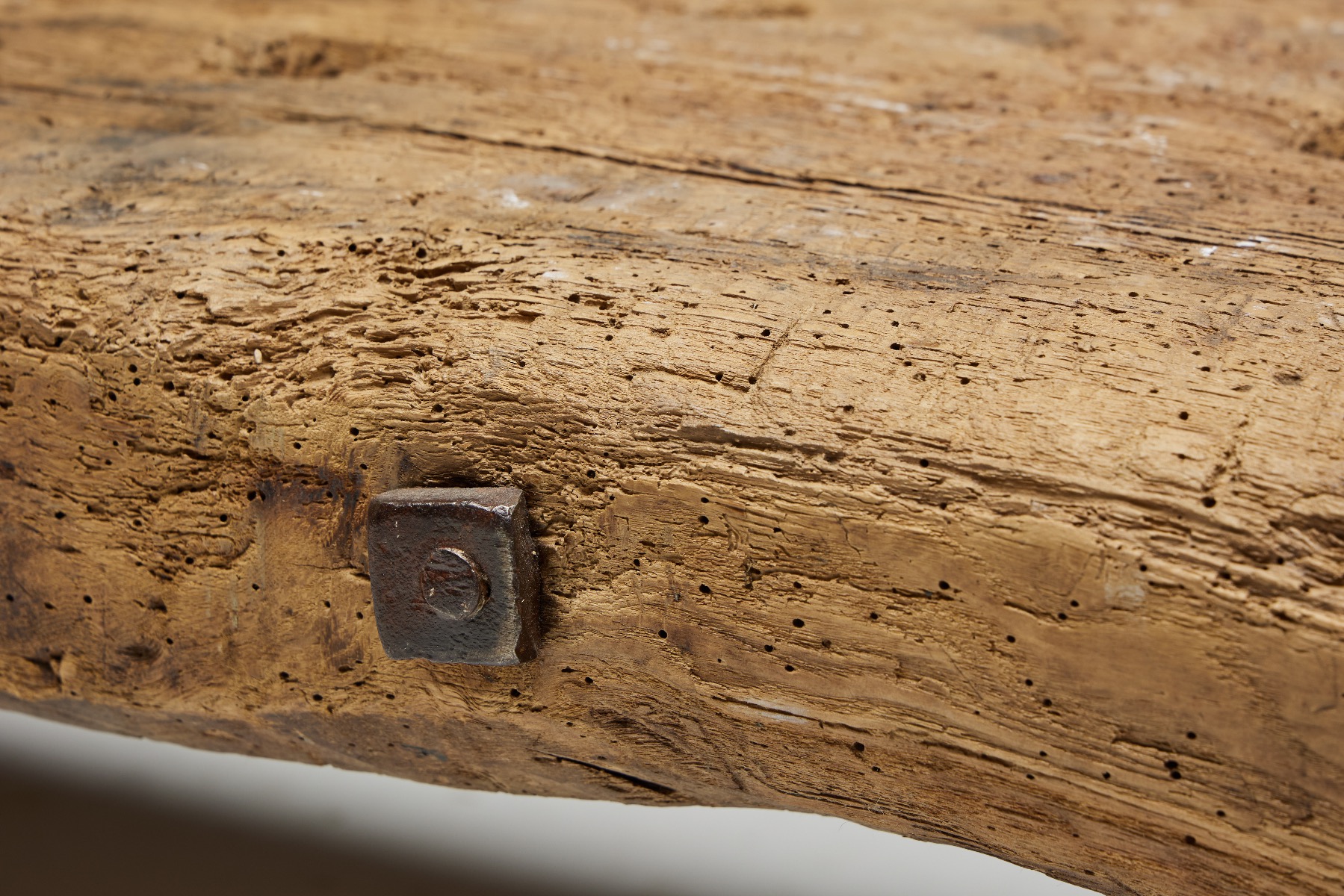 Organic primitive bench in solid wood