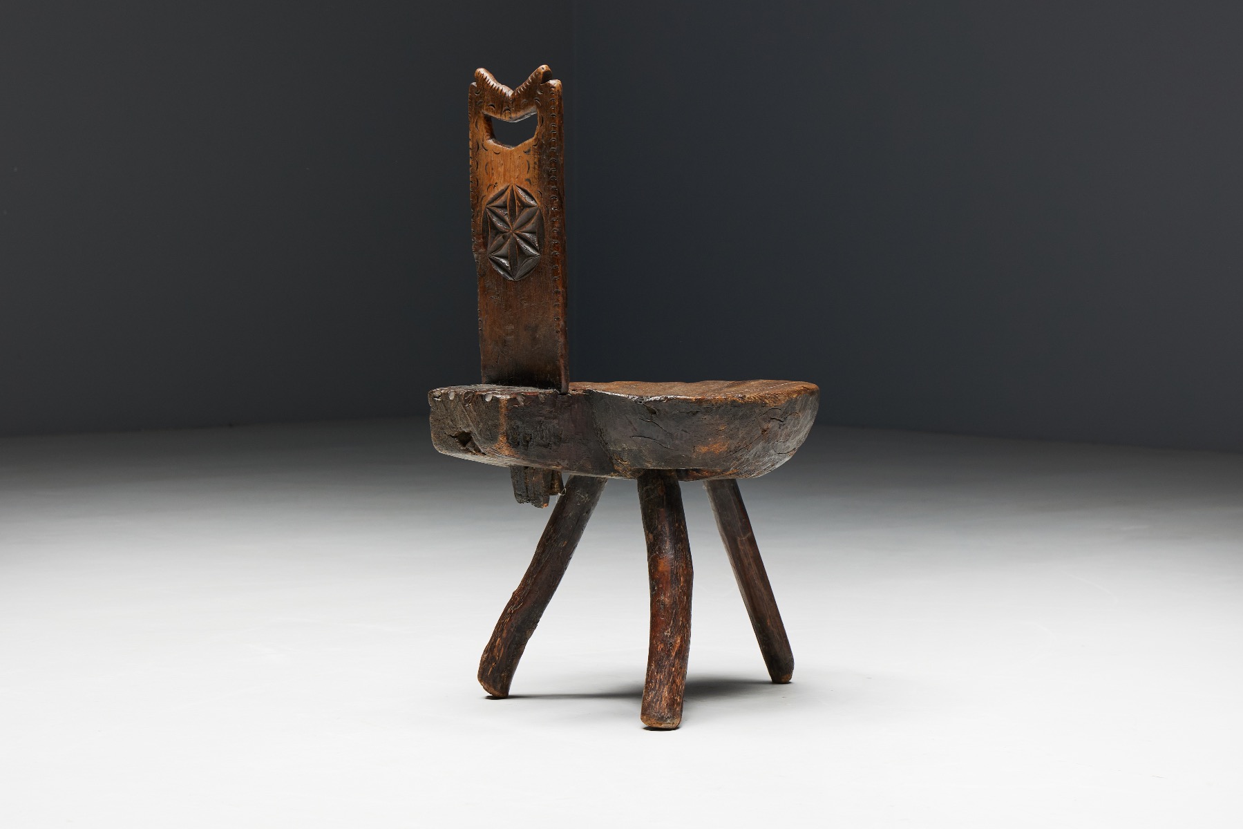 Rustic alpine tripod chairs in solid wood