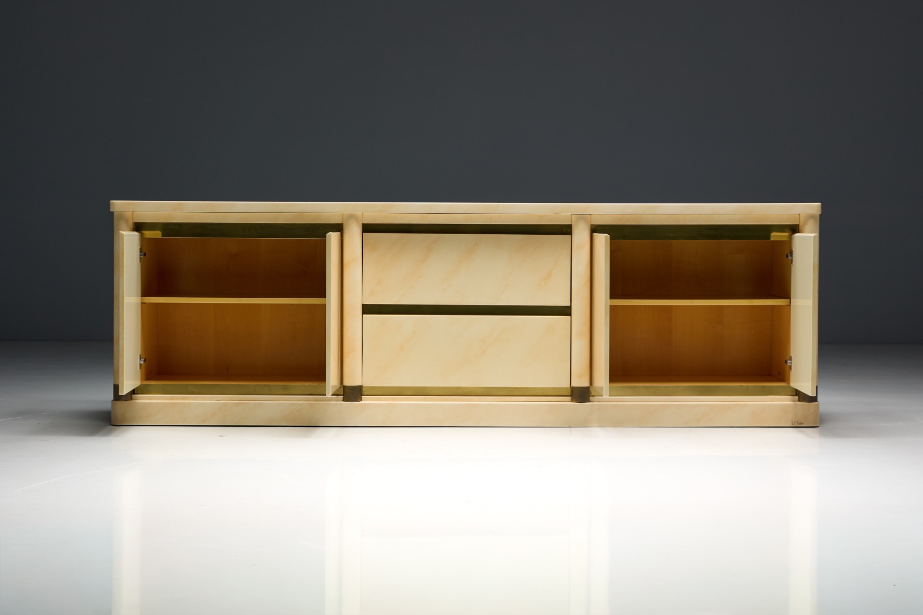 Sculptural French lacquered sideboard with faux marble finish