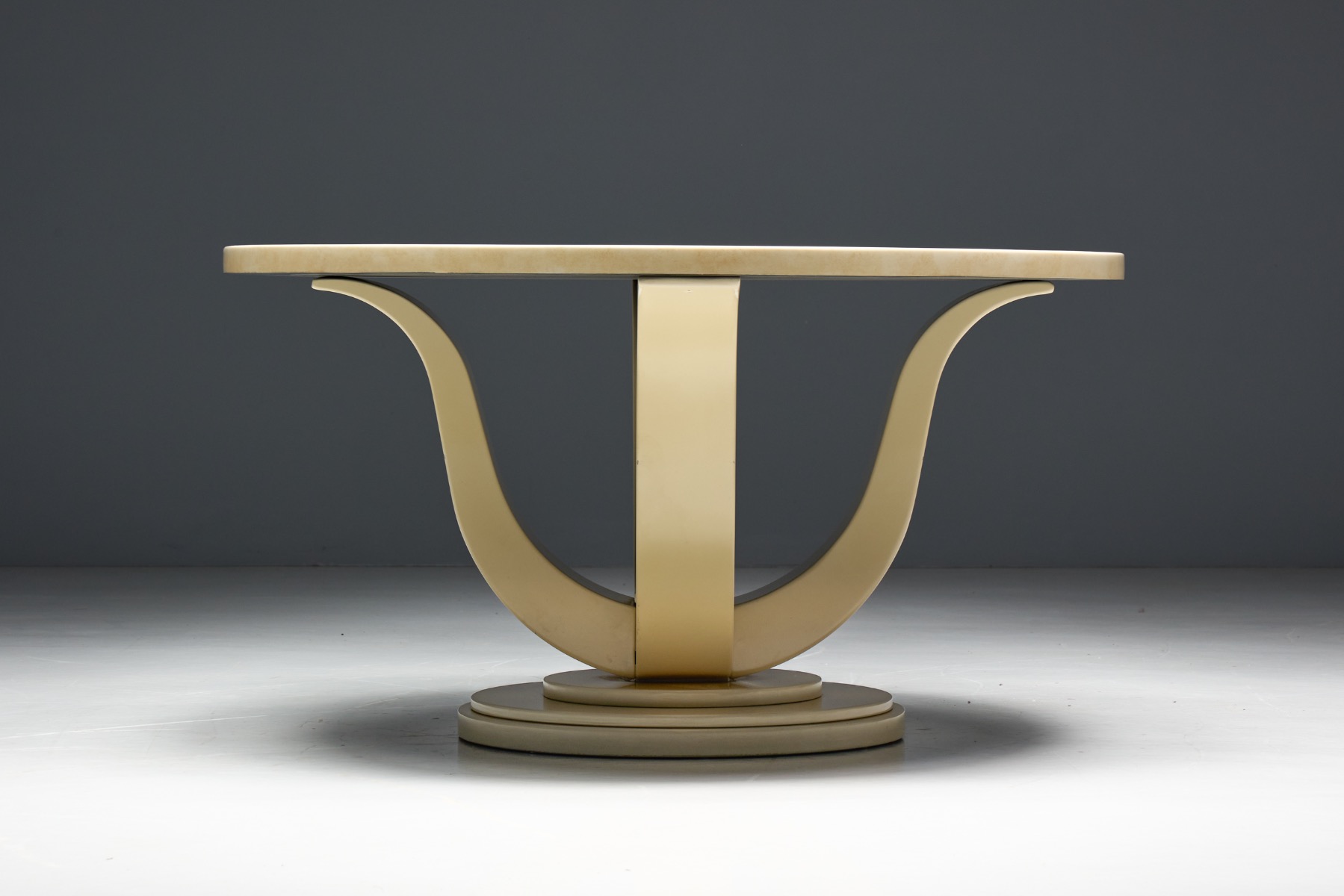 Sculptural French lacquered table with faux marble finish