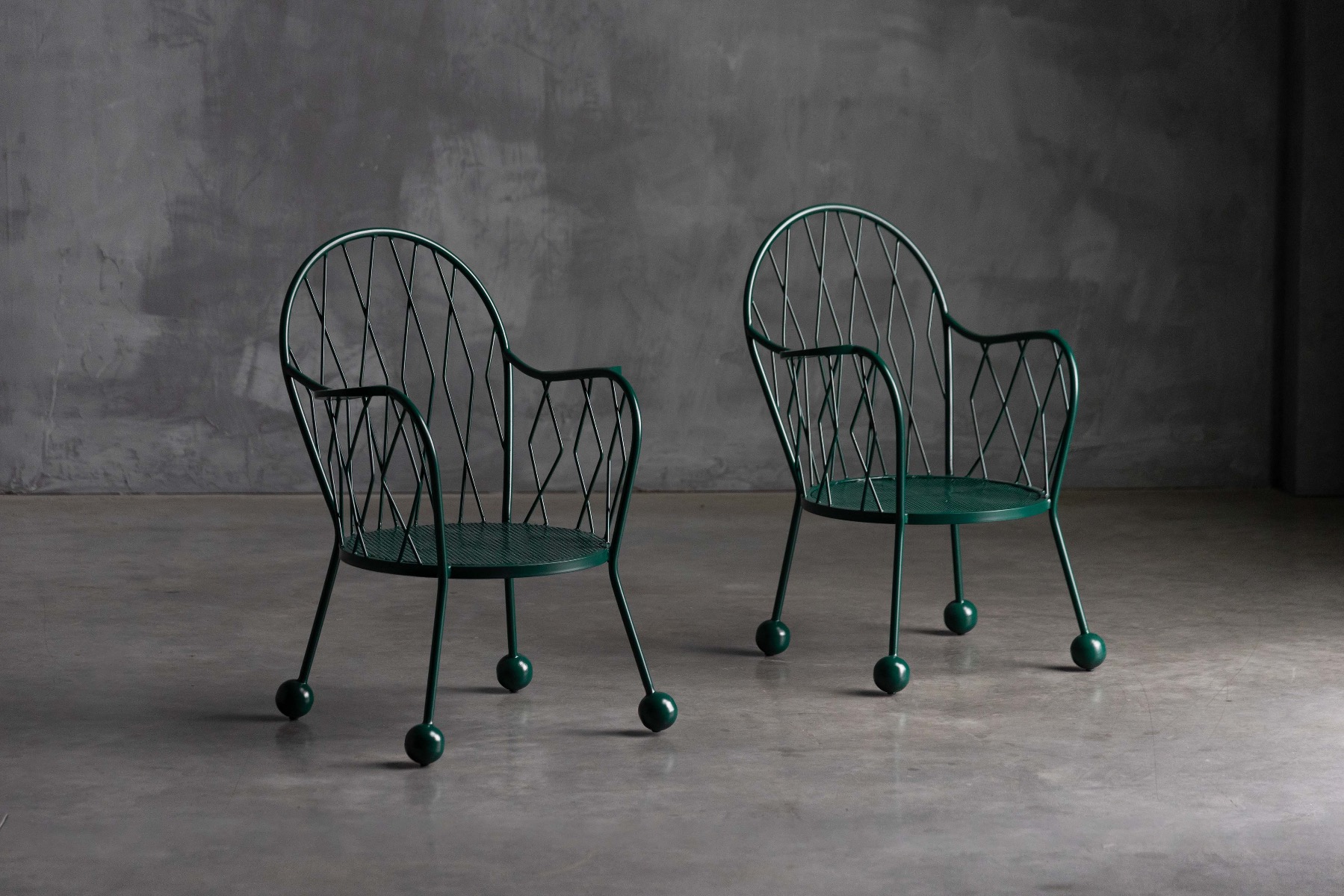Sculptural patio armchairs with mid century proportions
