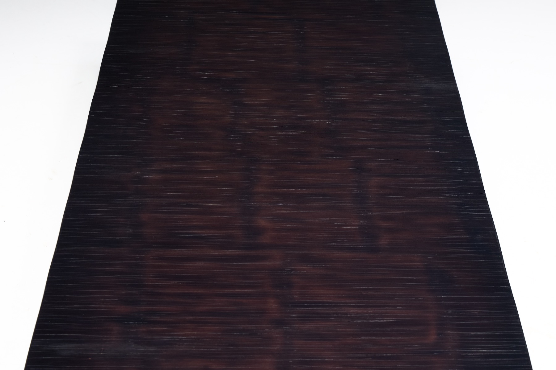 Timeless bamboo coffee table reflecting Axel Vervoordt aesthetics
