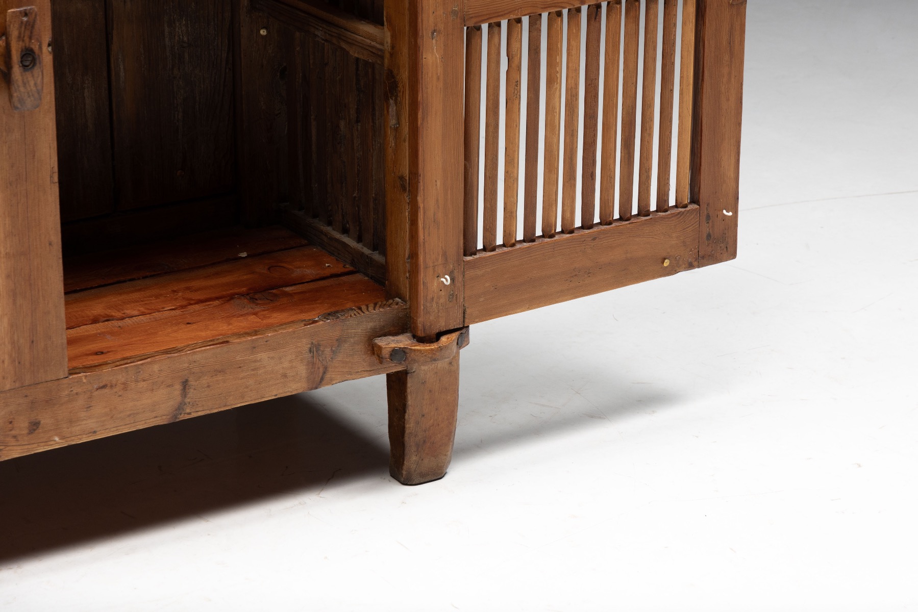 Timeworn alpine cheese drying cabinet showing authentic use