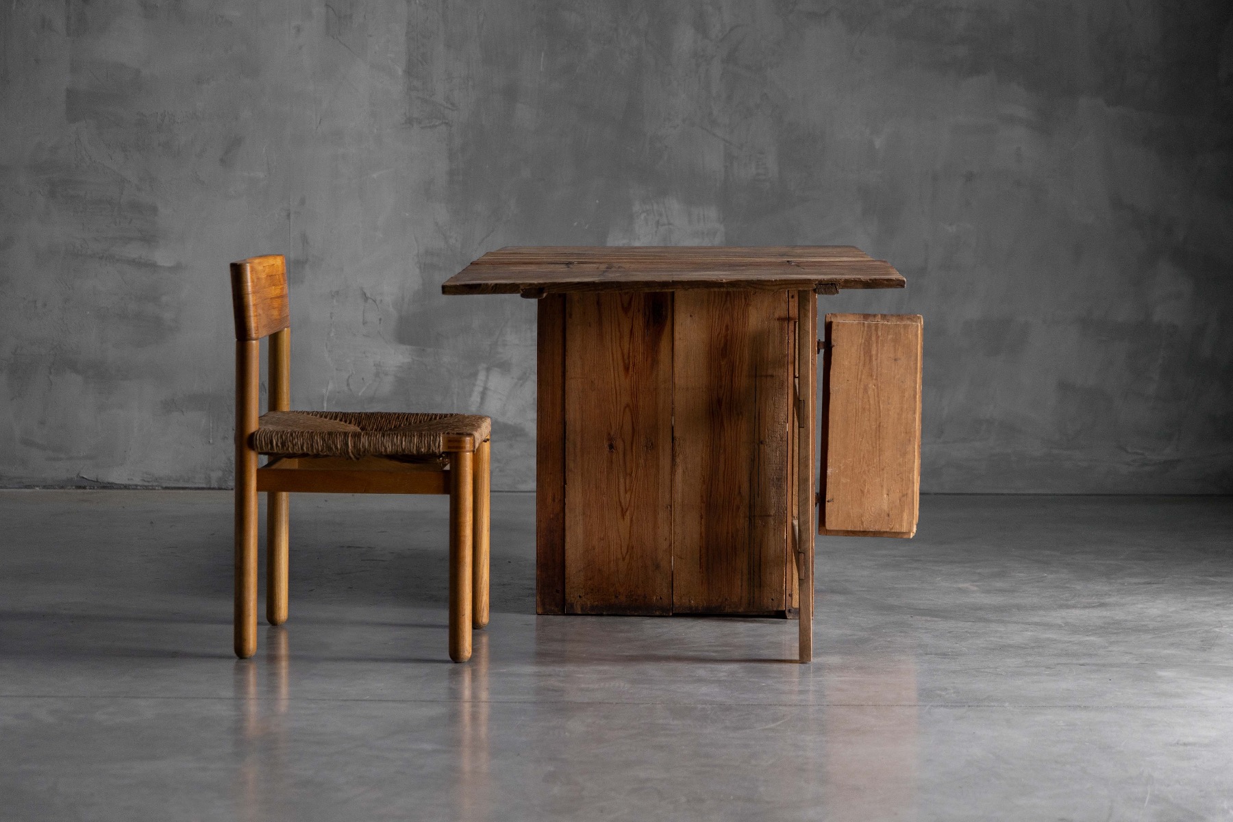 Timeworn antique worktable with folding leaves