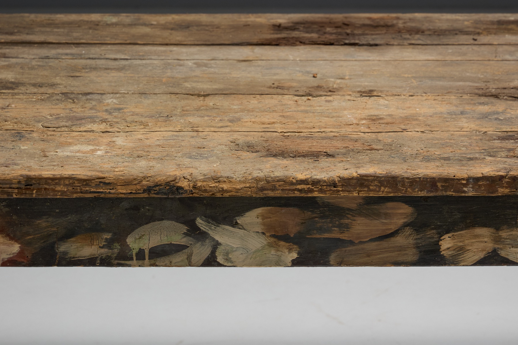 Vernacular farmhouse dining table with primitive form