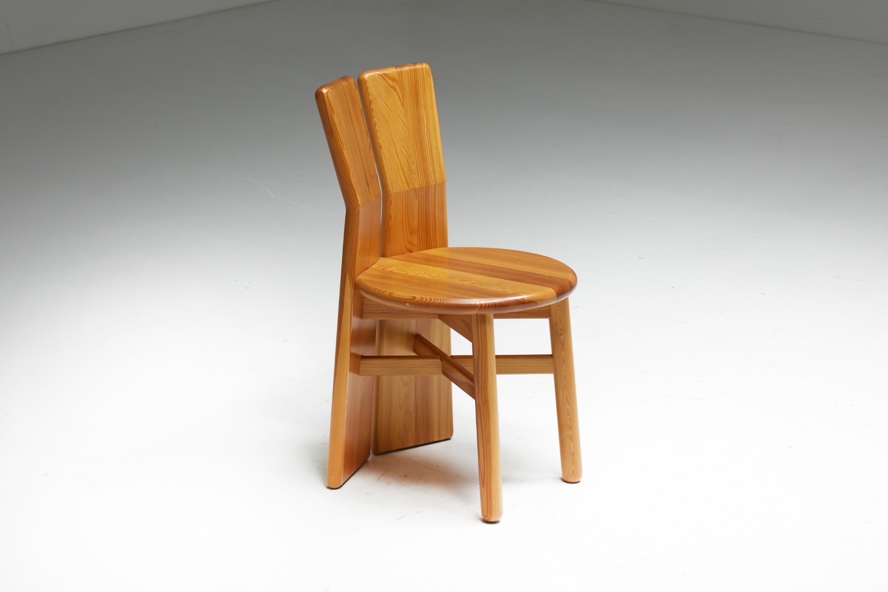 Architectural pine dining chairs in brutalist design