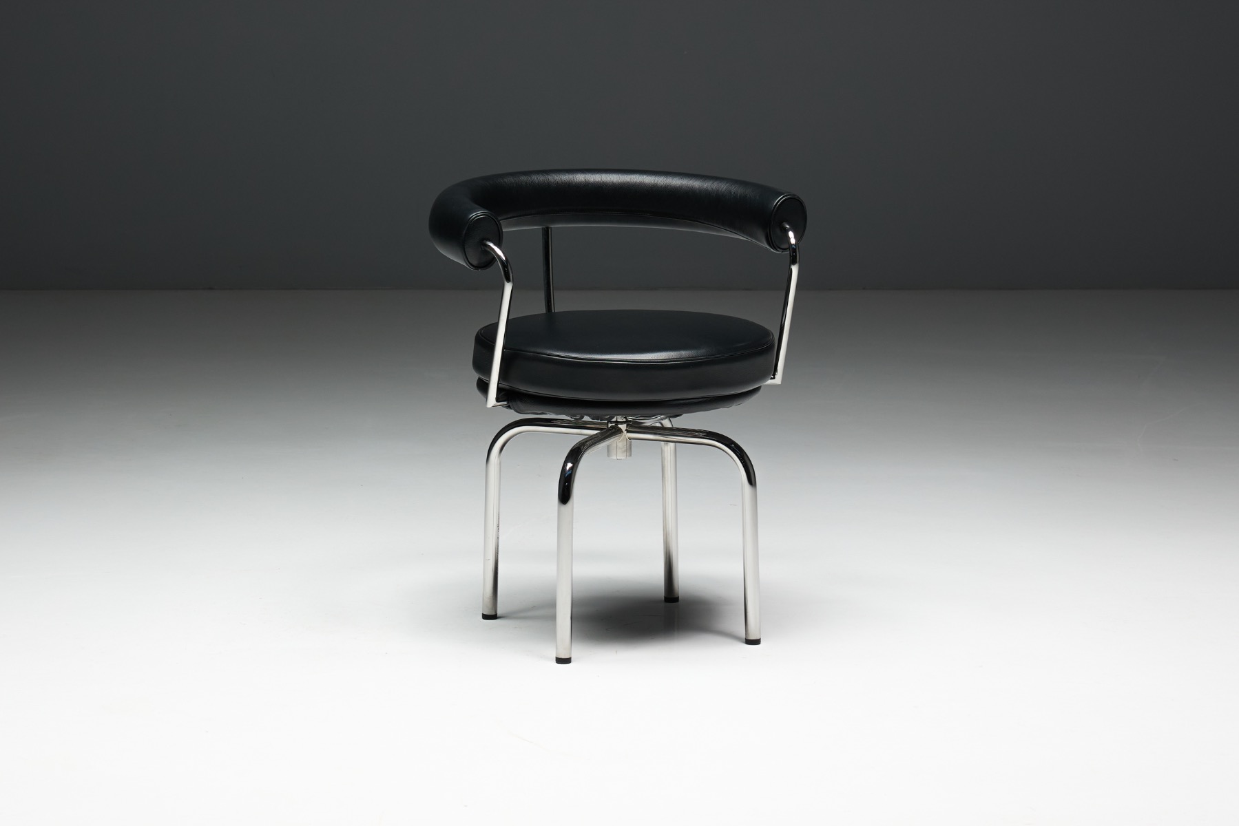 1980s production LC7 chairs in the Le Corbusier tradition