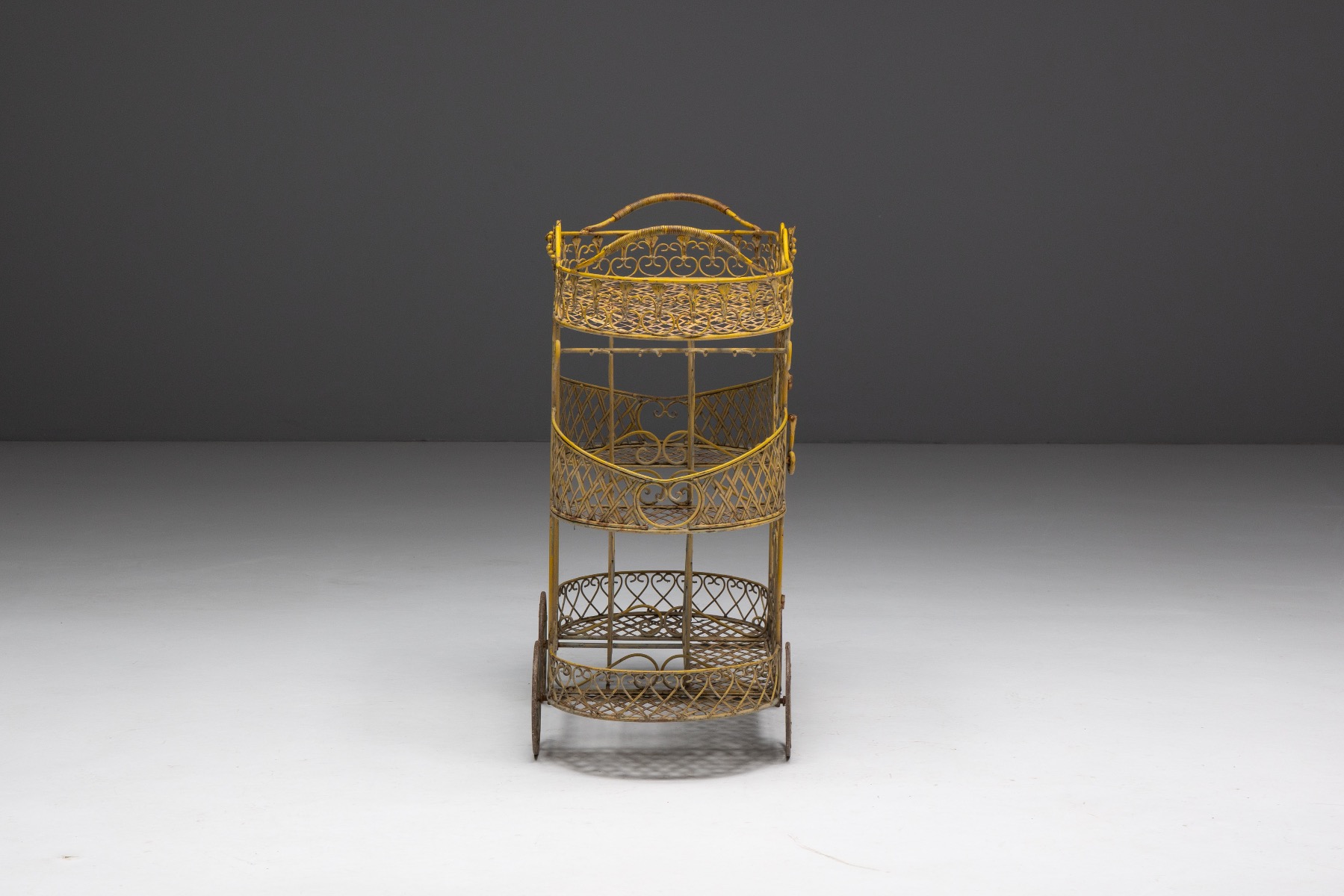 Collectible antique cast iron serving trolley with historic character