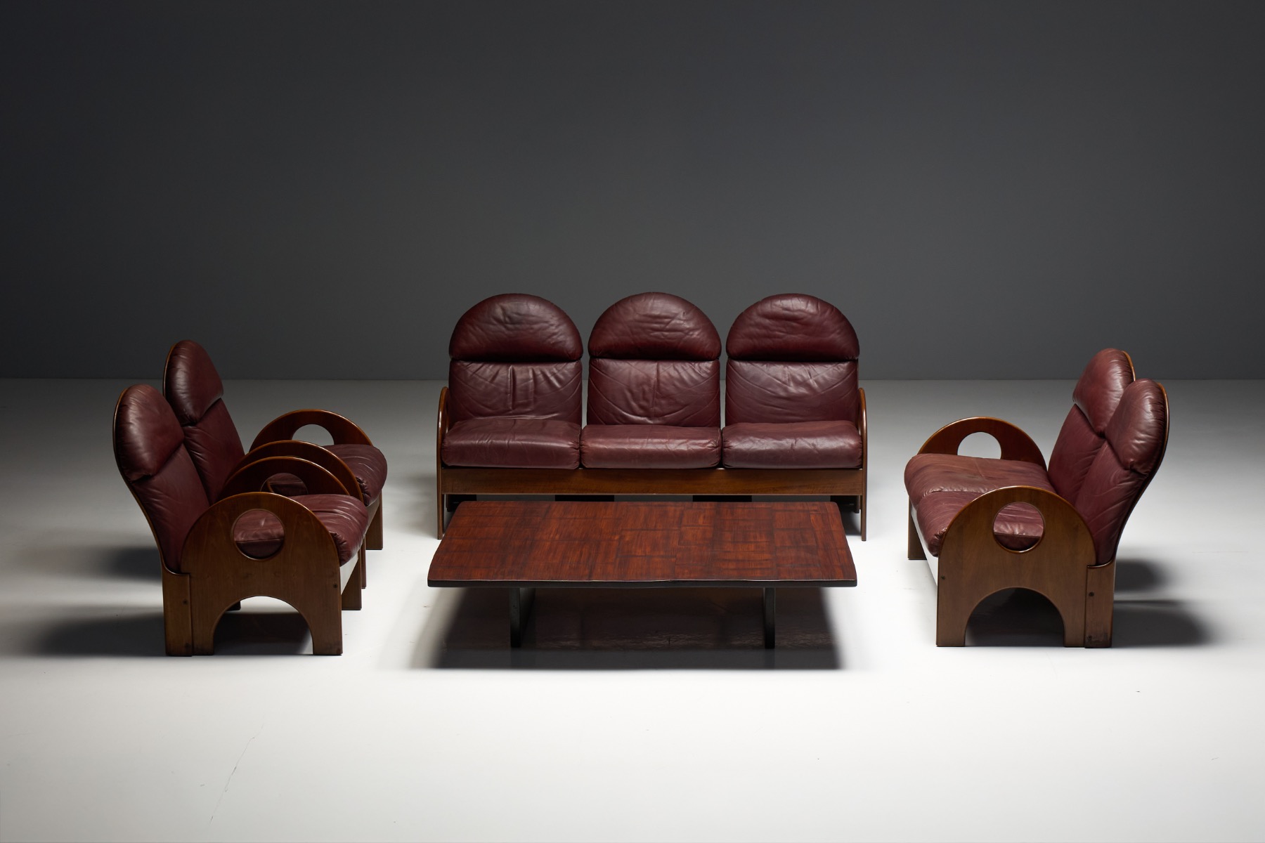 Collectible Italian Arcata loveseat designed by Gae Aulenti