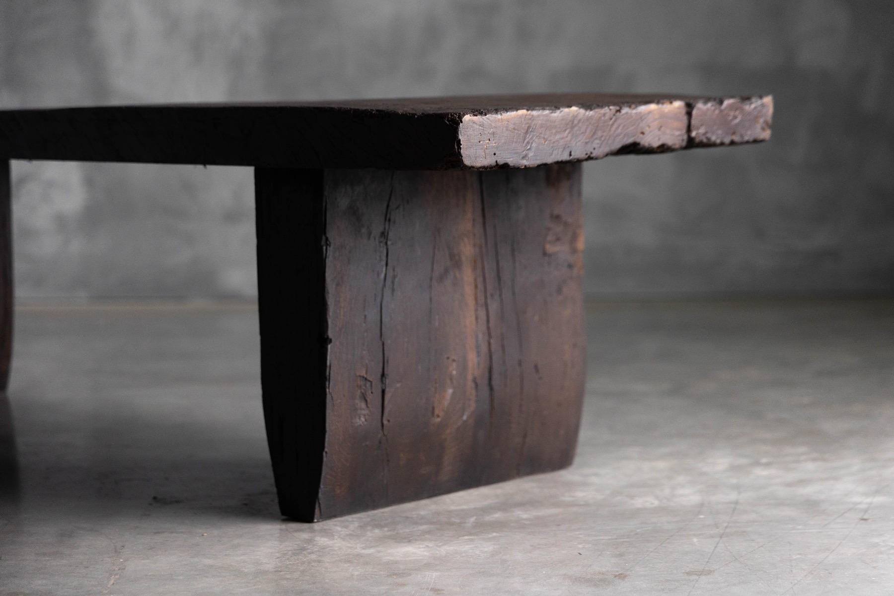 Country rustic coffee table with early brutalist expression