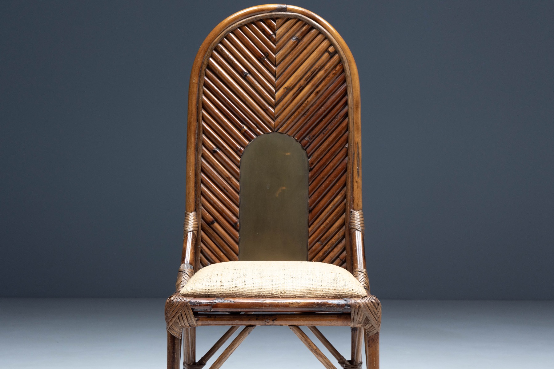 Gallery level bamboo and brass high back chair