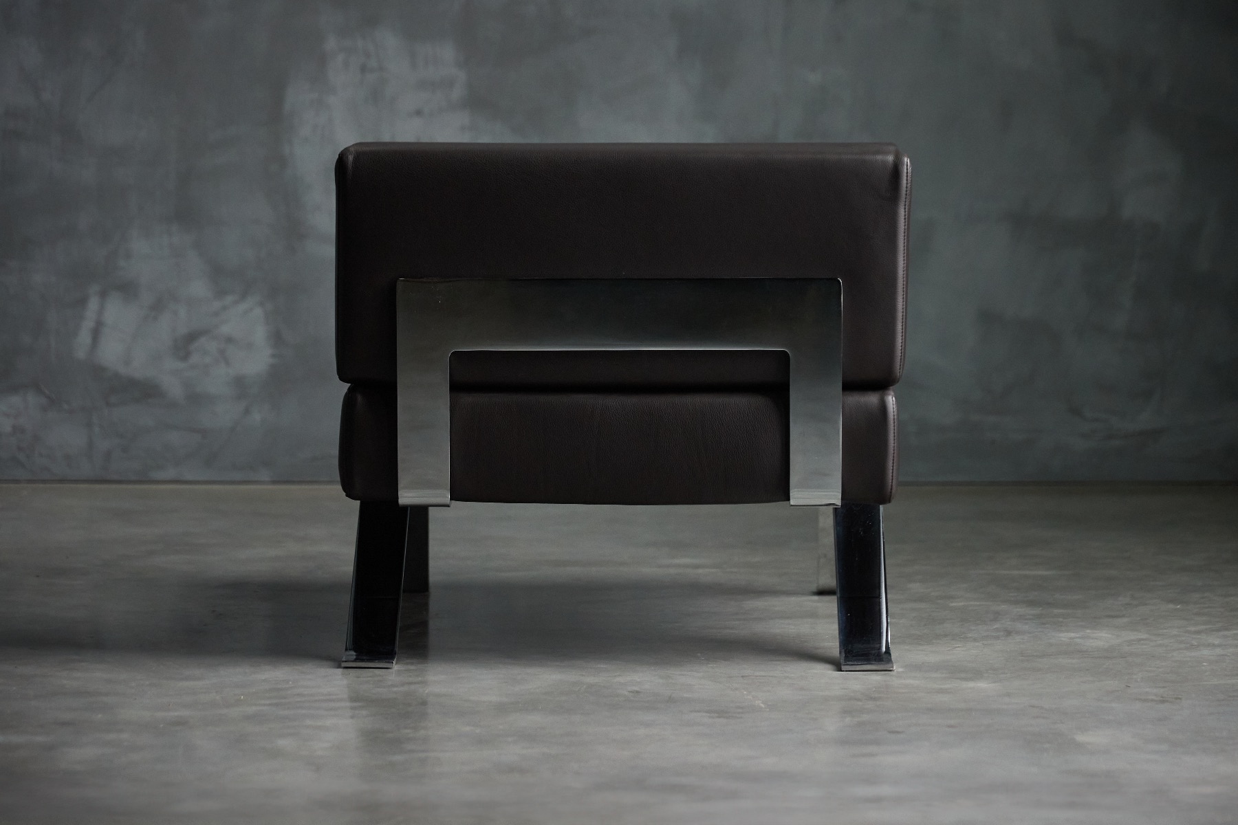 Refined modern lounge chair produced by Cassina
