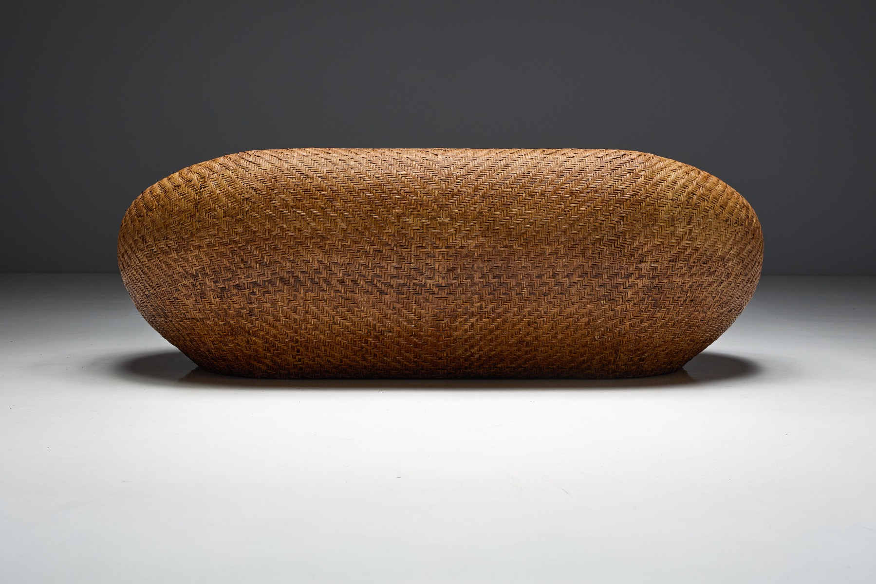 Handcrafted woven wicker sofa with timeless design
