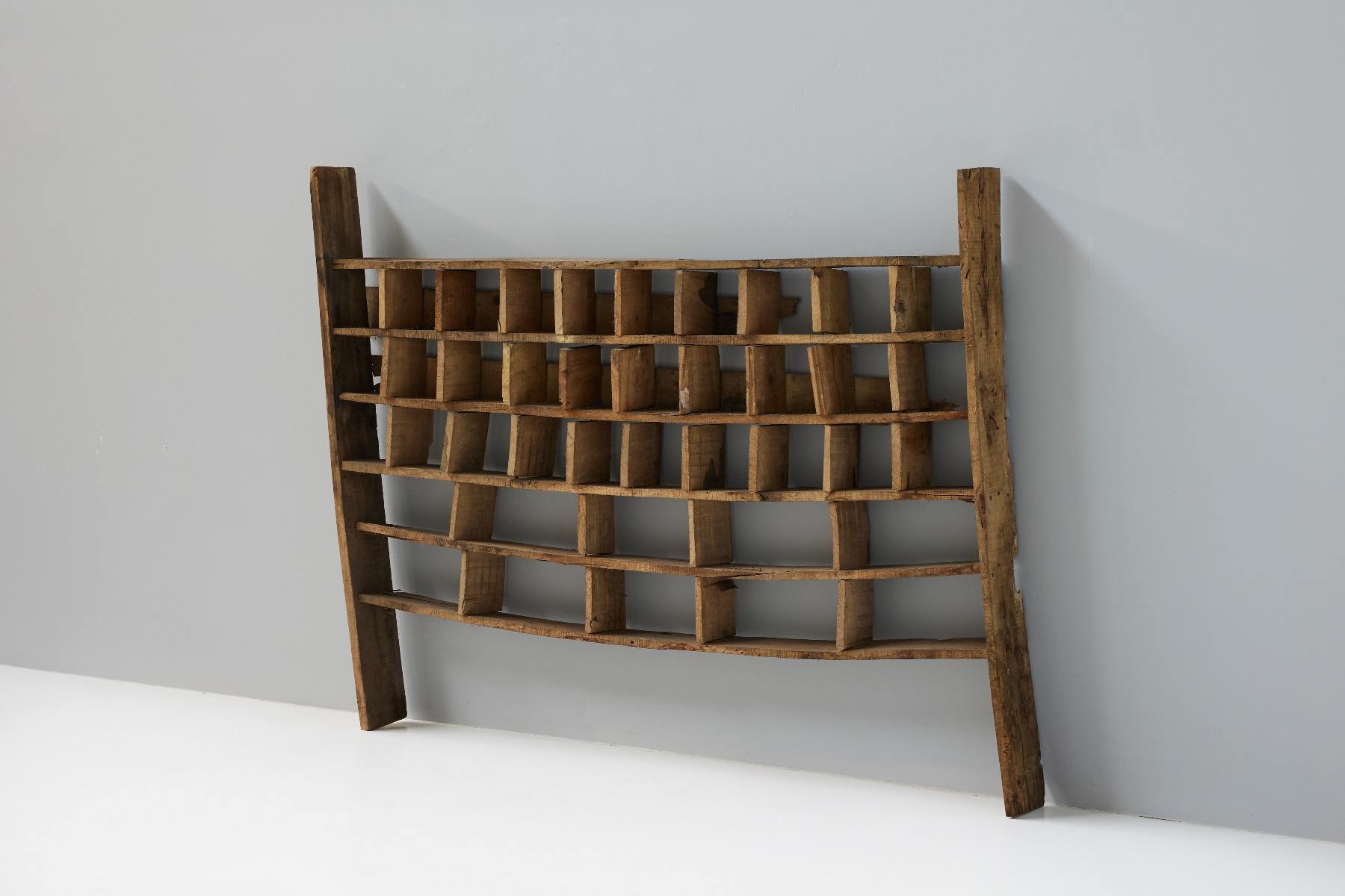 Handmade primitive shelving unit in wabi style