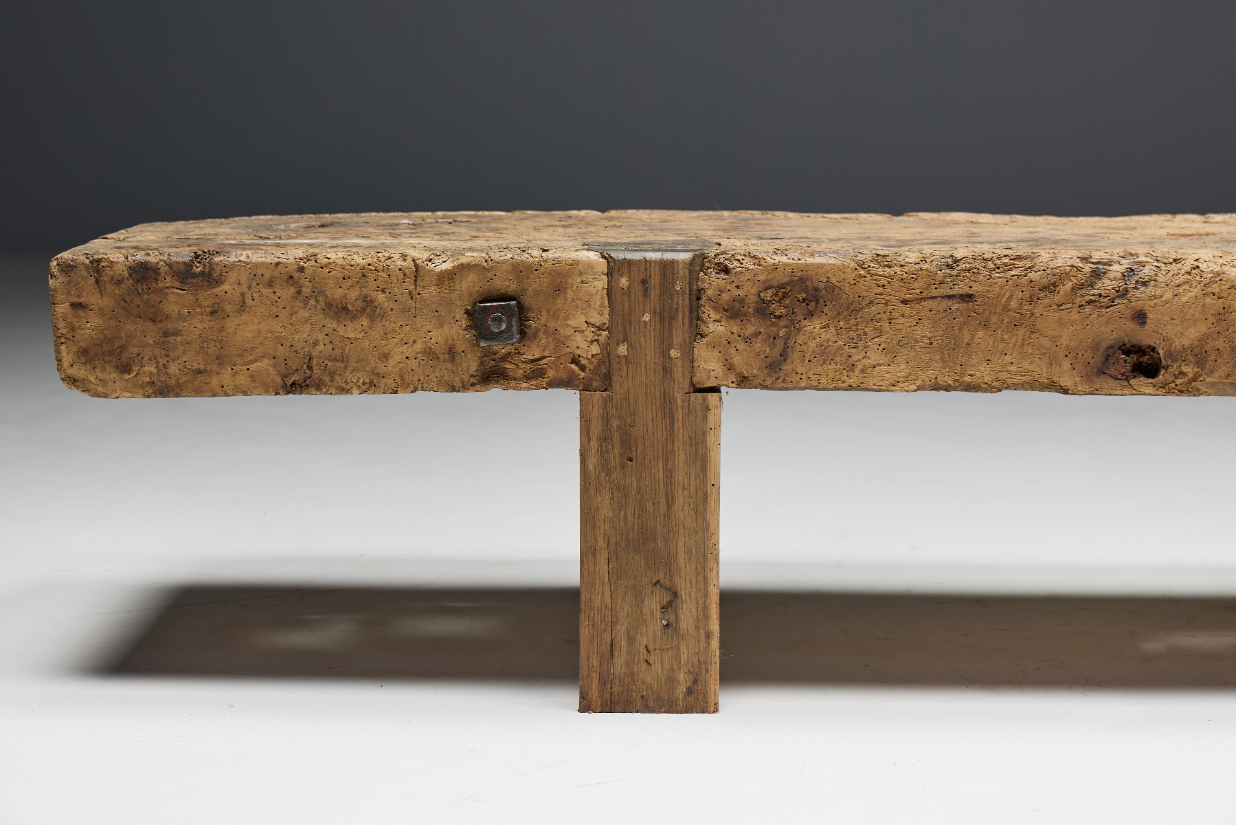 Handmade rustic bench in wabi sabi style
