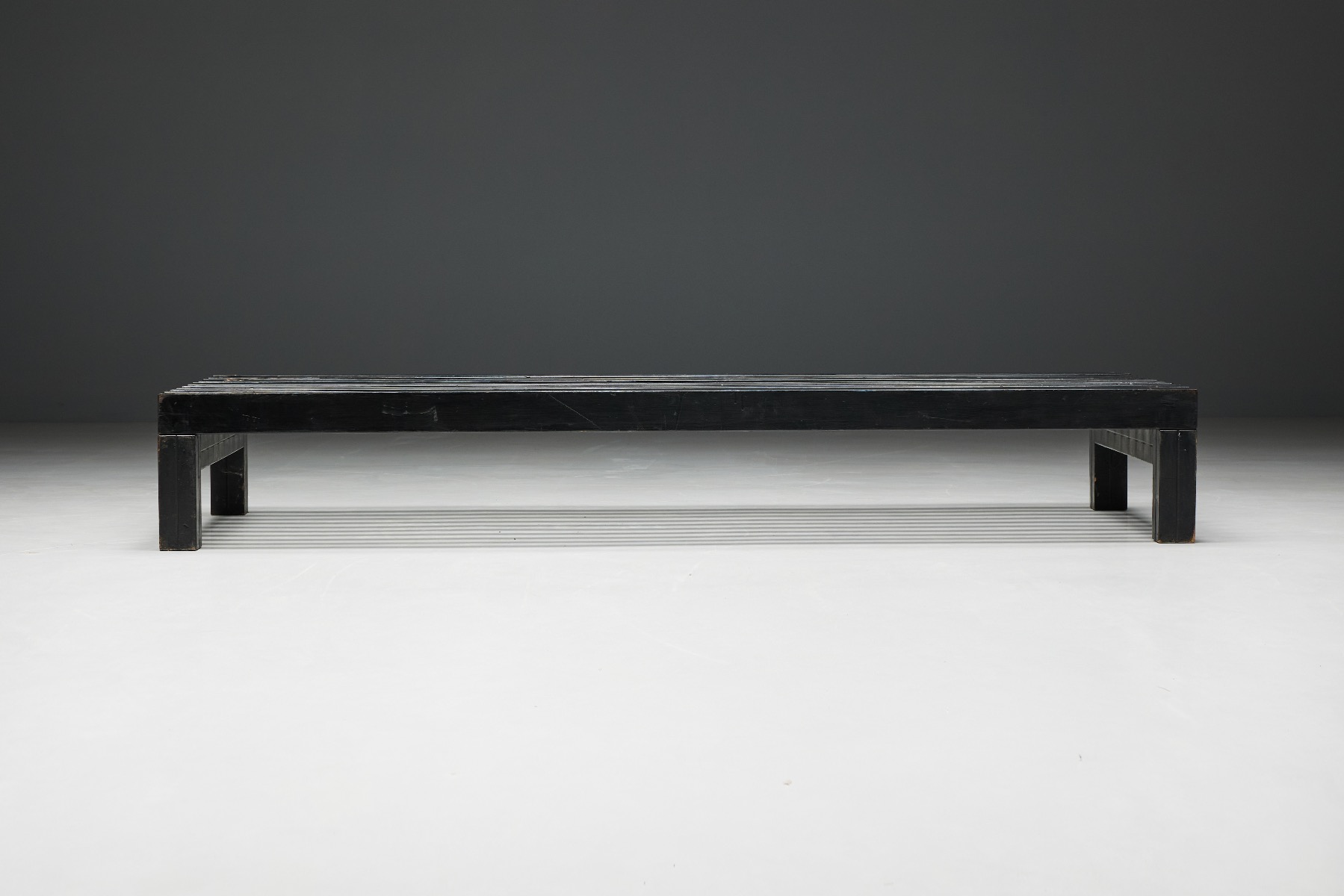 Mid century wood bench in slatted style