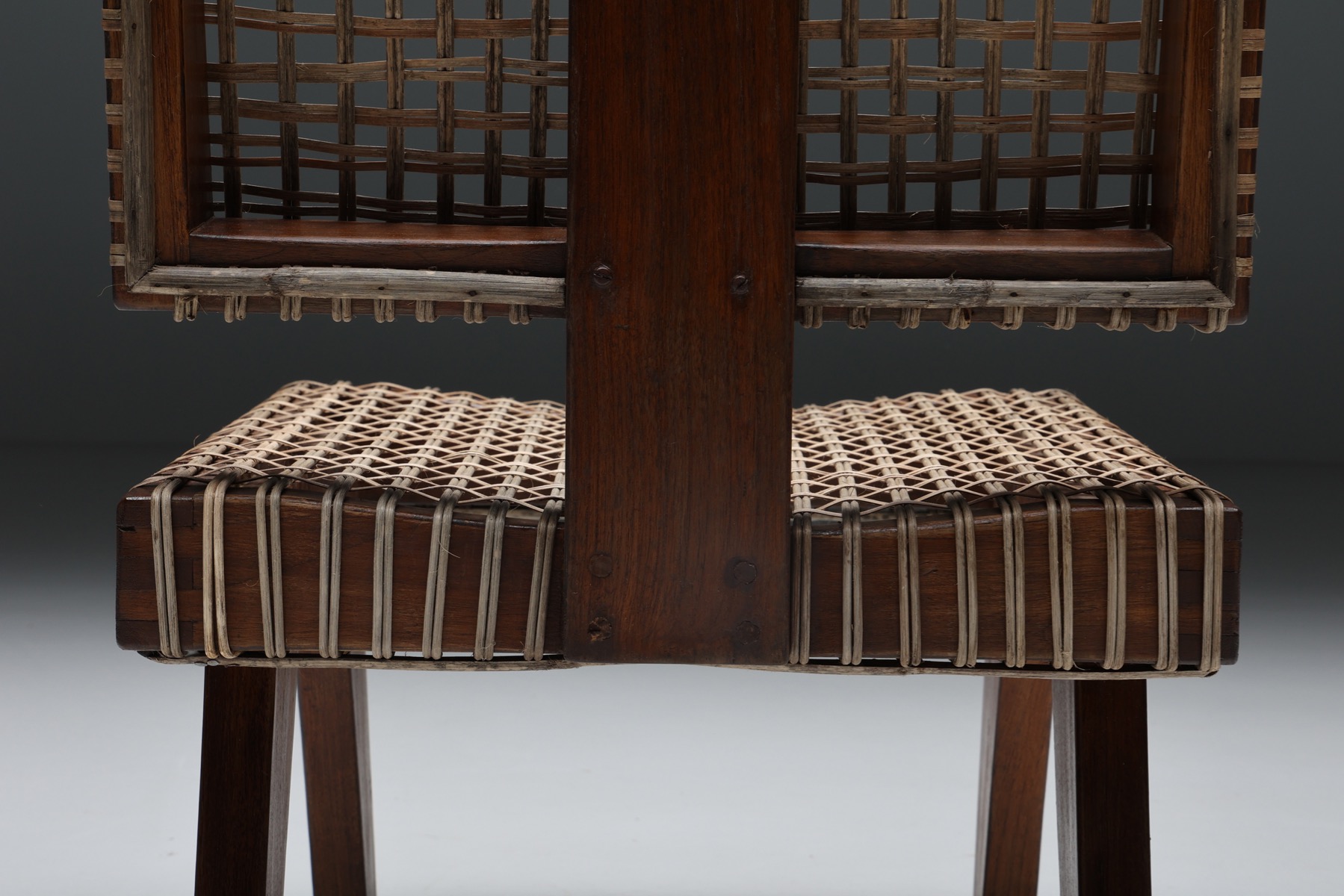 Minimalist low easy chair in Pierre Jeanneret style