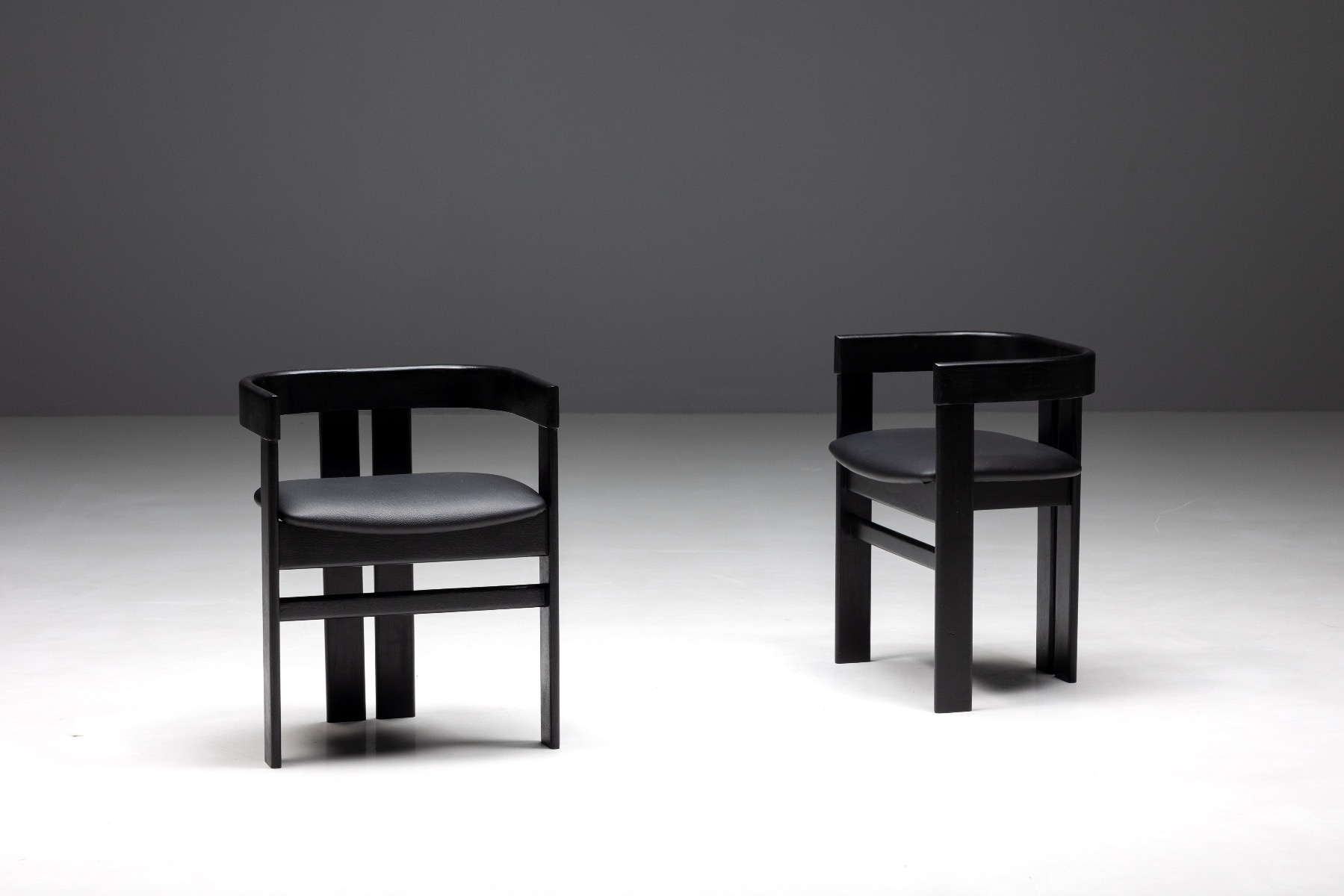 Minimalist Pigreco chairs in Italian modernism