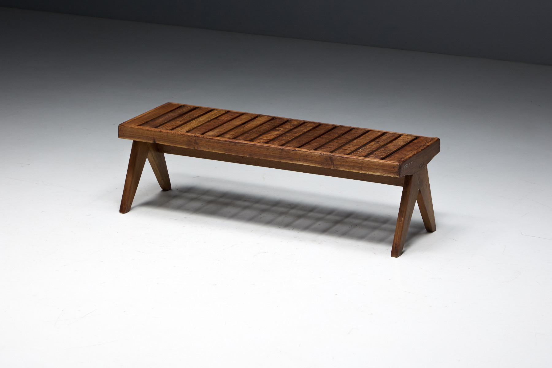 Modern teak slatted bench with clean lines