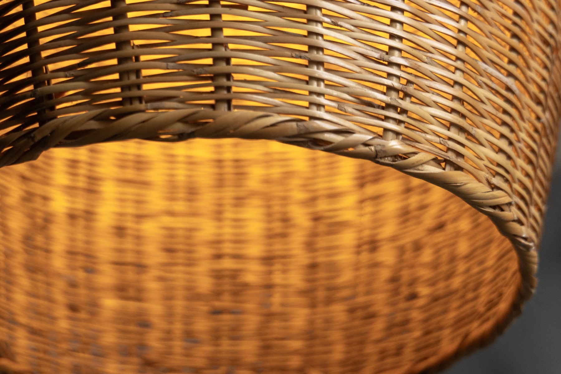 Organic form rattan pendant lamp with natural texture