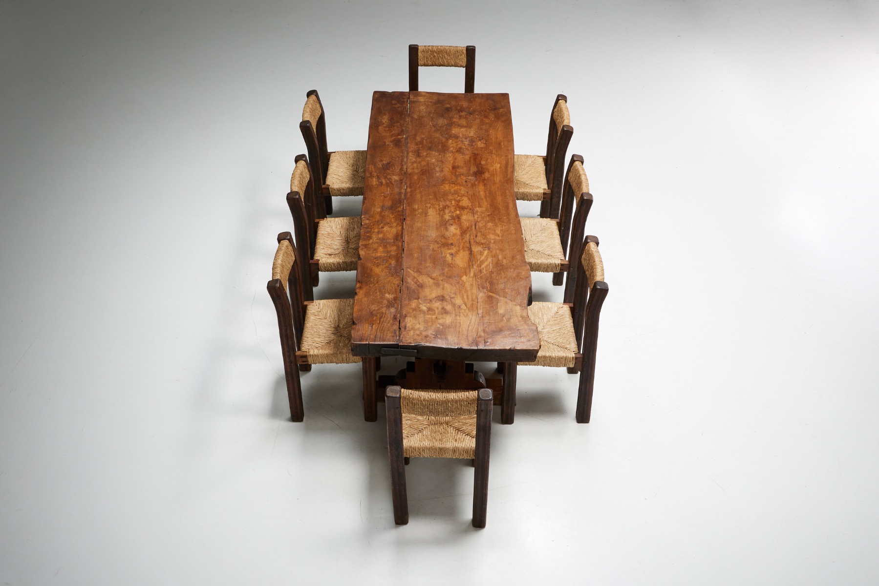 Robust solid wood dining table in brutalist style