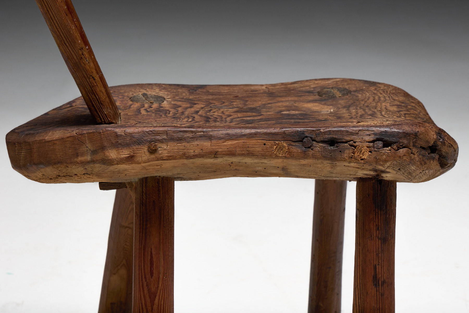 Rural Alpine folk chair with timeworn surface