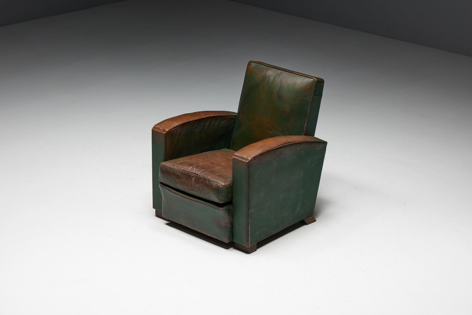 Timeworn leather club chairs 1930s