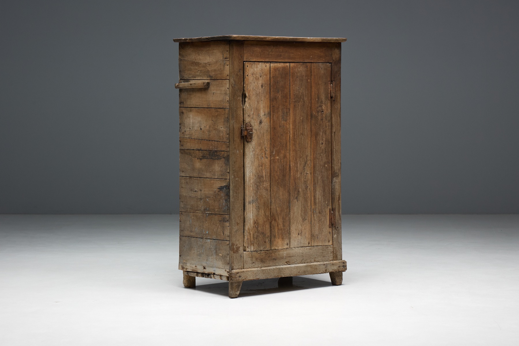 Classic rustic vernacular cabinet with aged surface