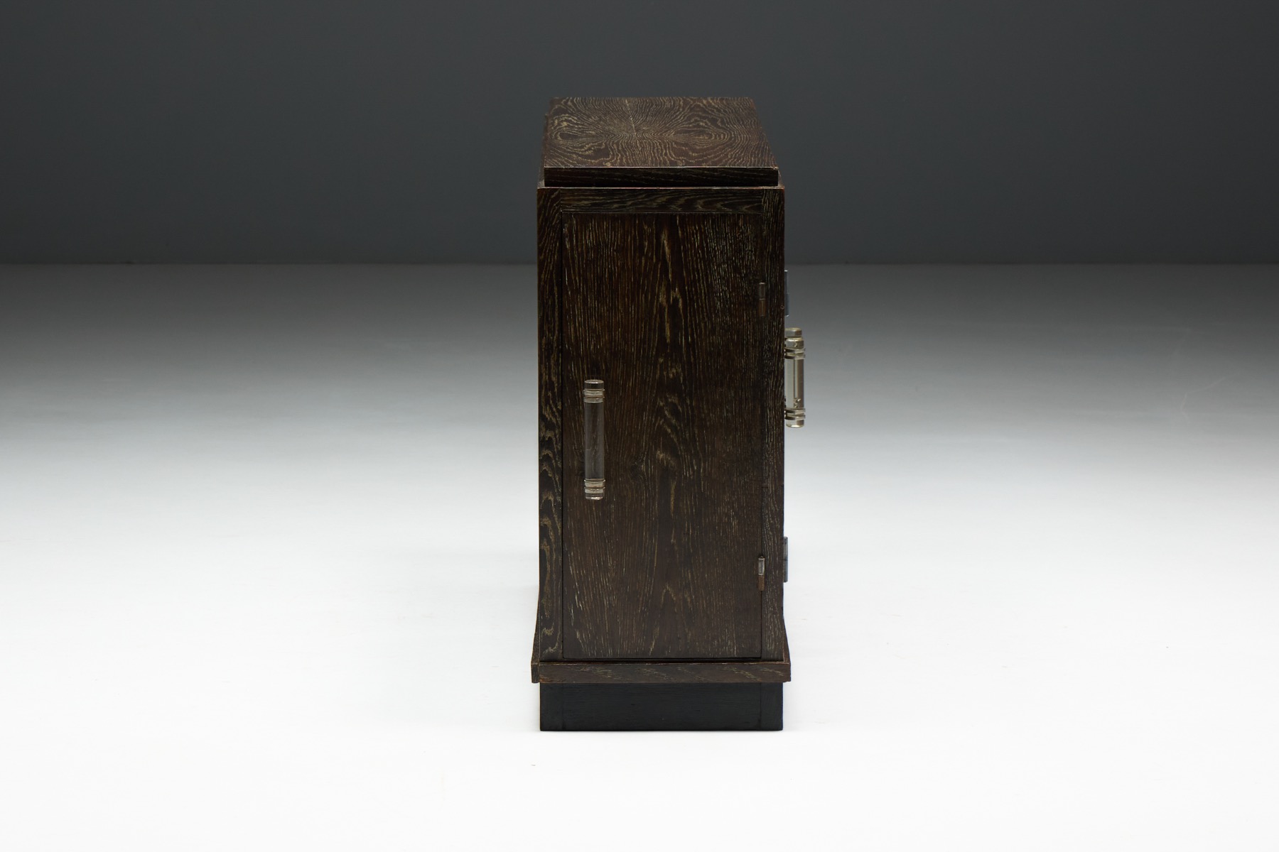 Art Deco oak case piece combining modernism and tradition
