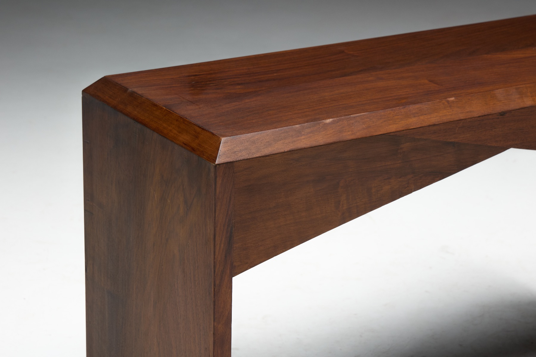 Contemporary walnut bench inspired by mid century design