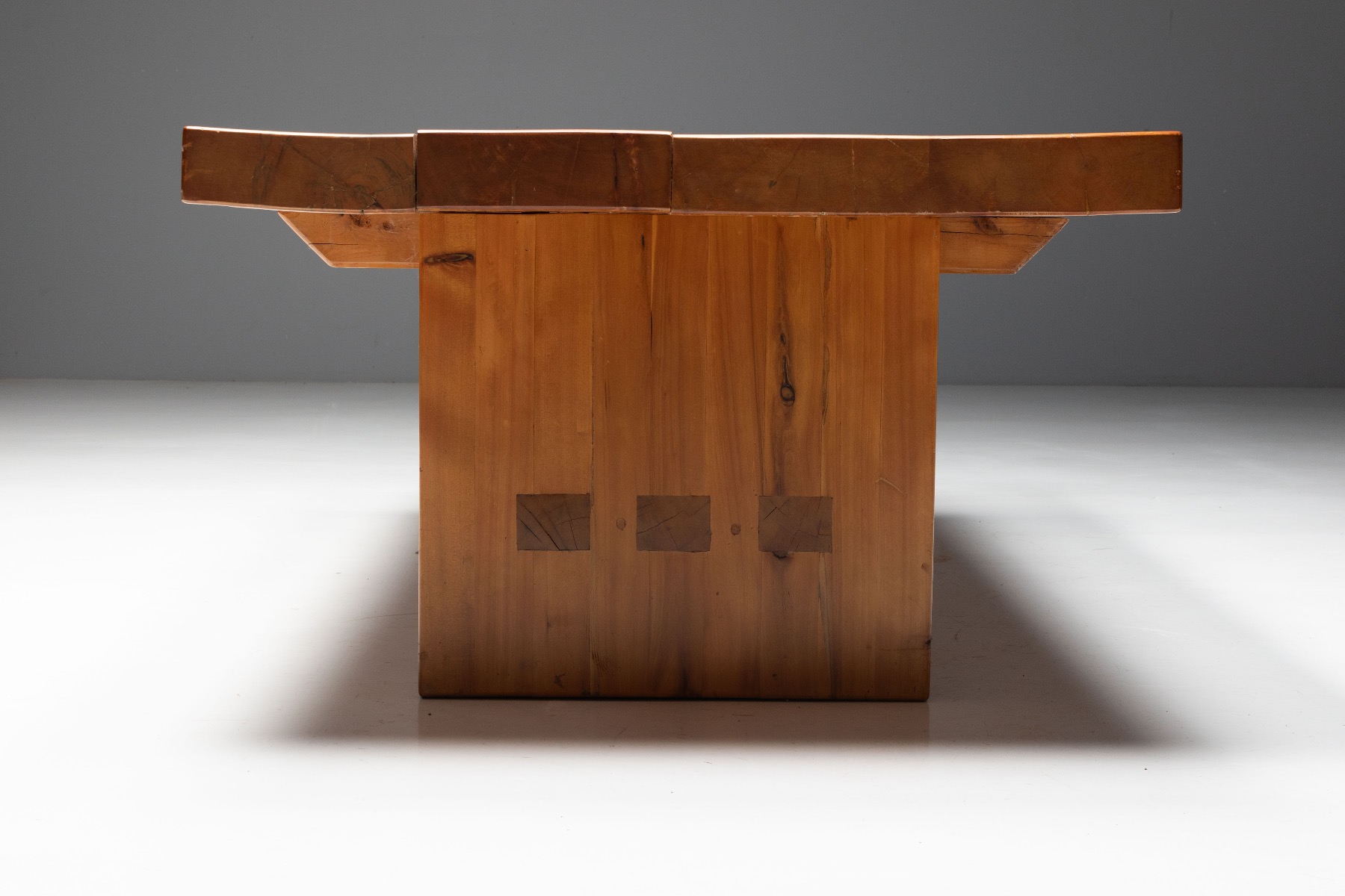 Dining table in elmwood inspired by Pierre Chapo design principles