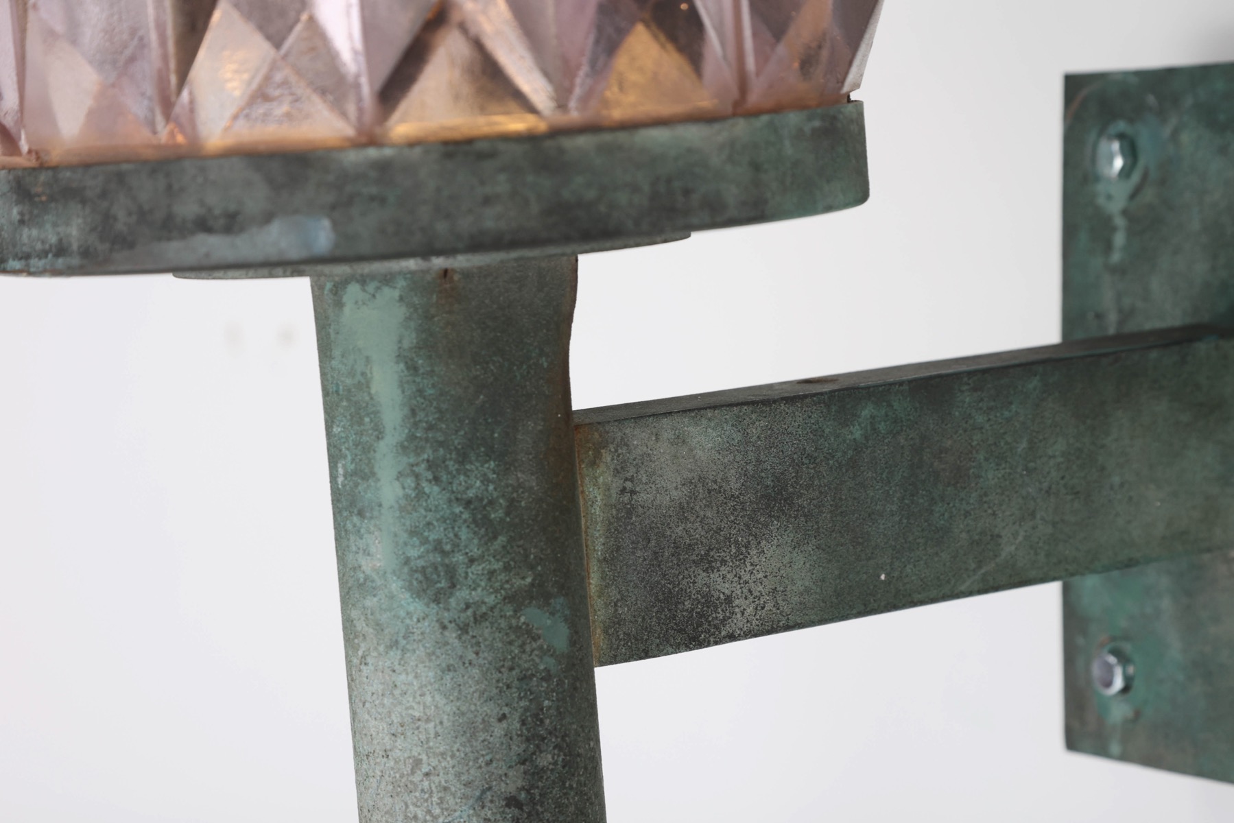 Iconic art deco wall sconces in iron and glass