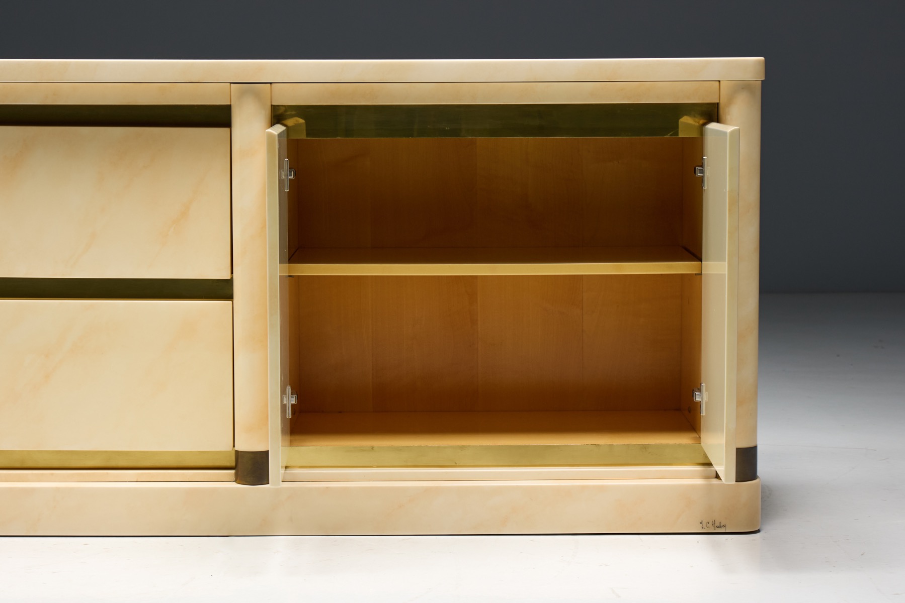 Iconic lacquered sideboard with faux marble effect by Jean Claude Mahey