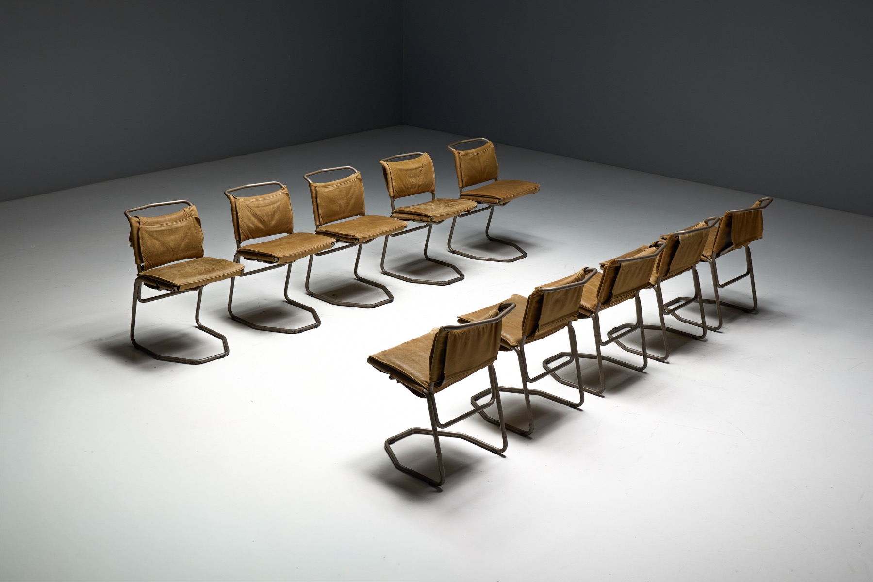Industrial modern dining chairs in leather and steel