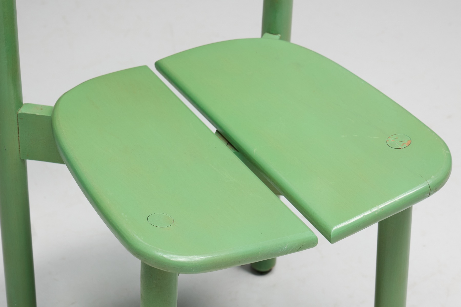 Organic modern green dining chair with balanced form