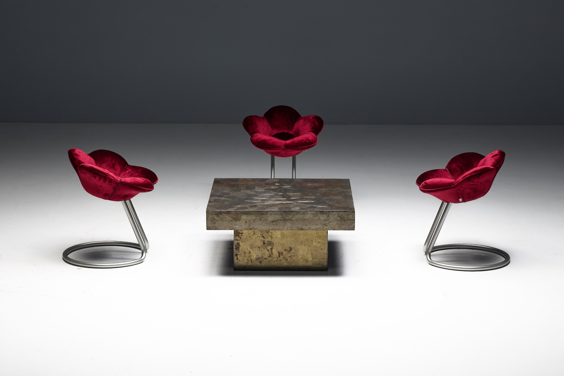 Solid steel coffee table with sculptural silhouette