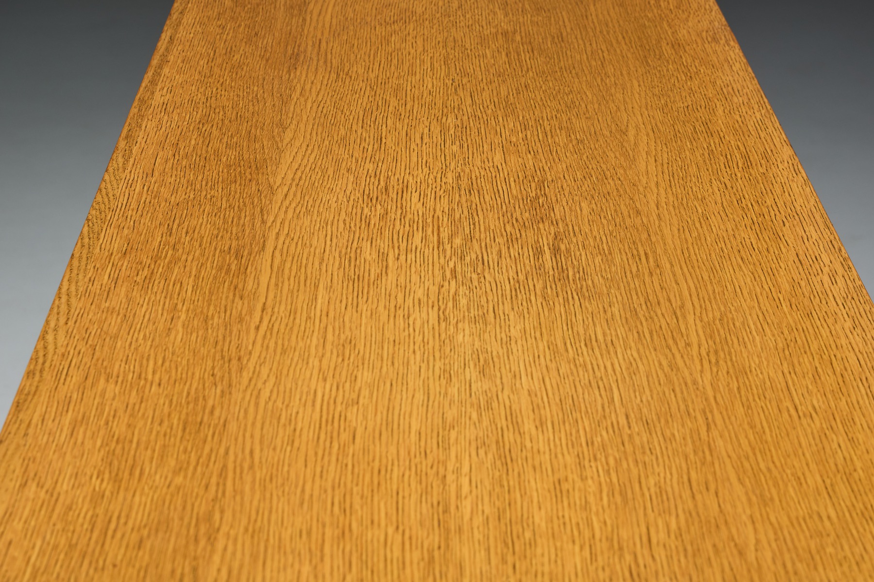Monolithic oak cabinet emphasizing brutalist design