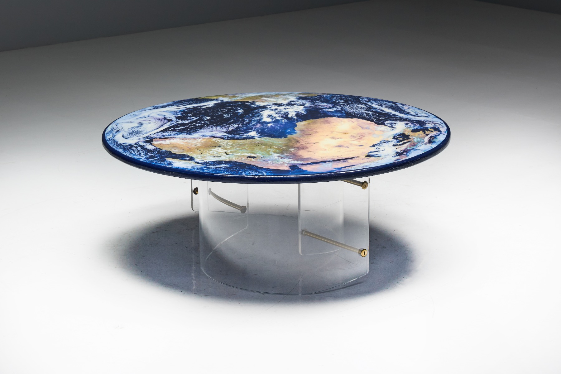 Refined plexi base coffee table in globe style