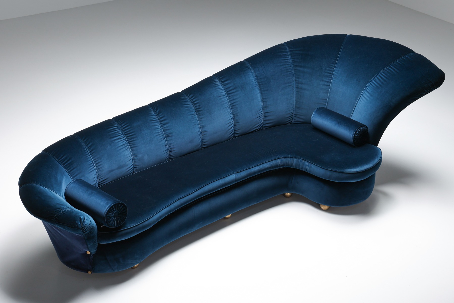 Statement curved velvet Hollywood Regency sofa