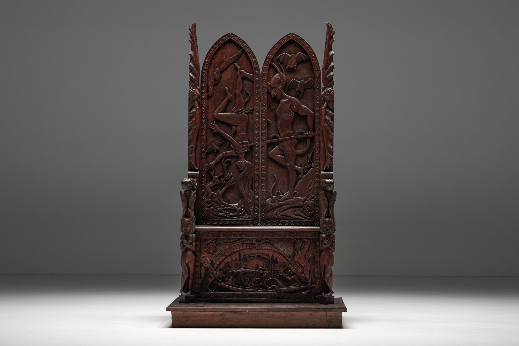 Statement throne chair with relief carving design